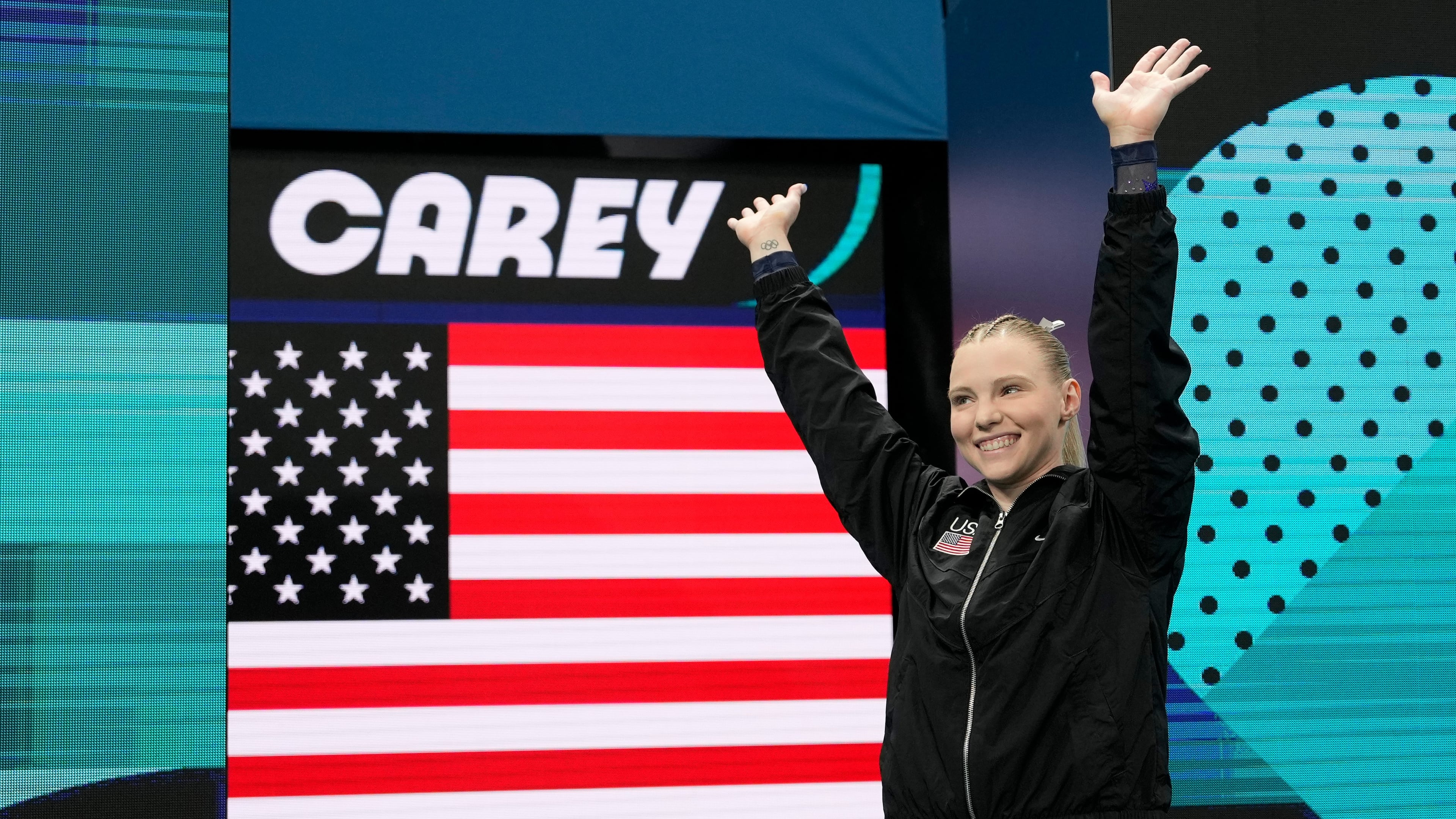 FILE - Jade Carey, of the United States, is introduced during the women's artistic gymnastics individual vault finals at Bercy Arena at the 2024 Summer Olympics, Aug. 3, 2024, in Paris. (AP Photo/Francisco Seco, File)