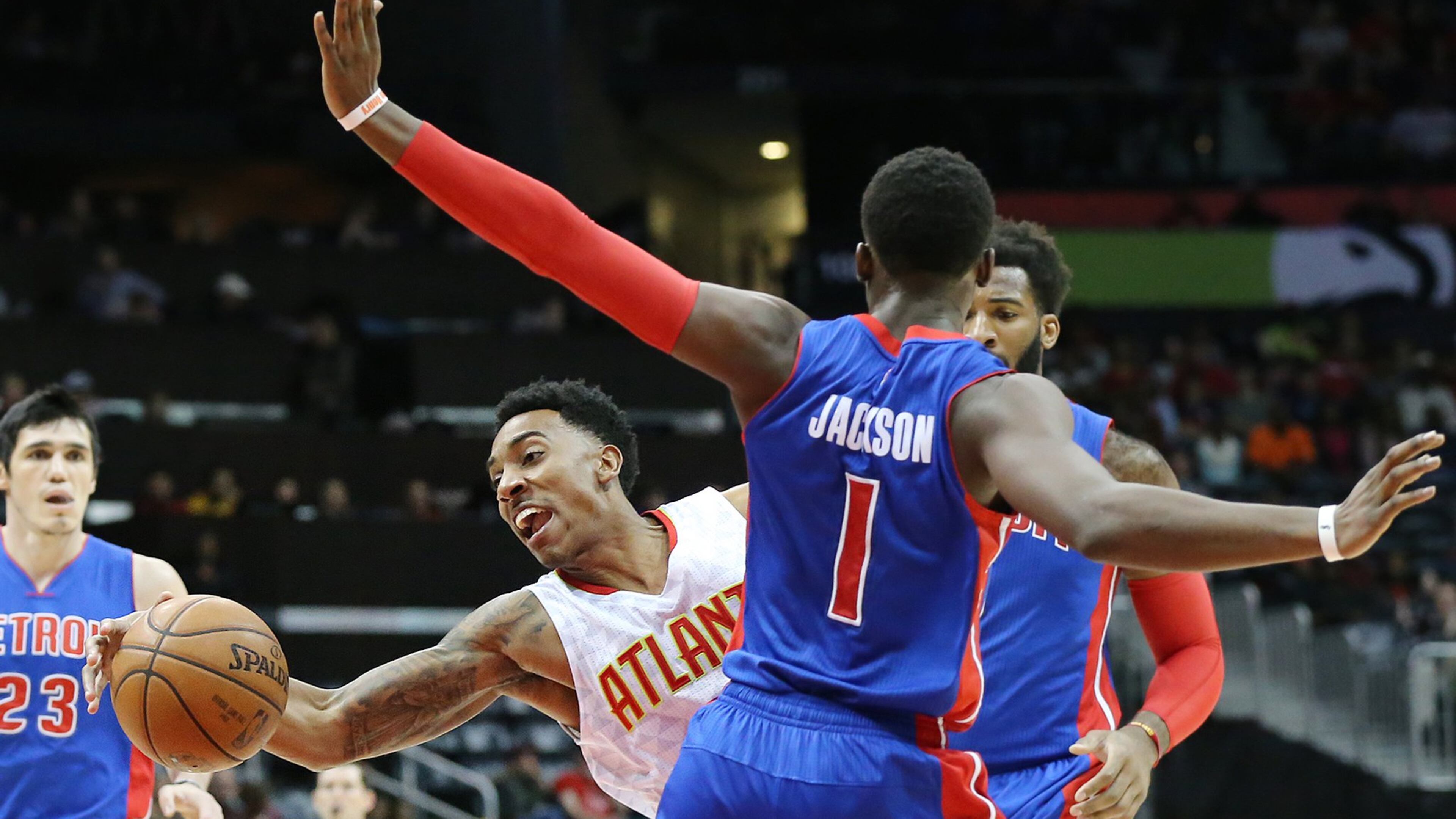 Hawks guard Jeff Teague is fouled by Pistons guard Reggie Jackson on his way to the basket in a basketball game on Wednesday, Dec. 23, 2015, in Atlanta. Curtis Compton / ccompton@ajc.com