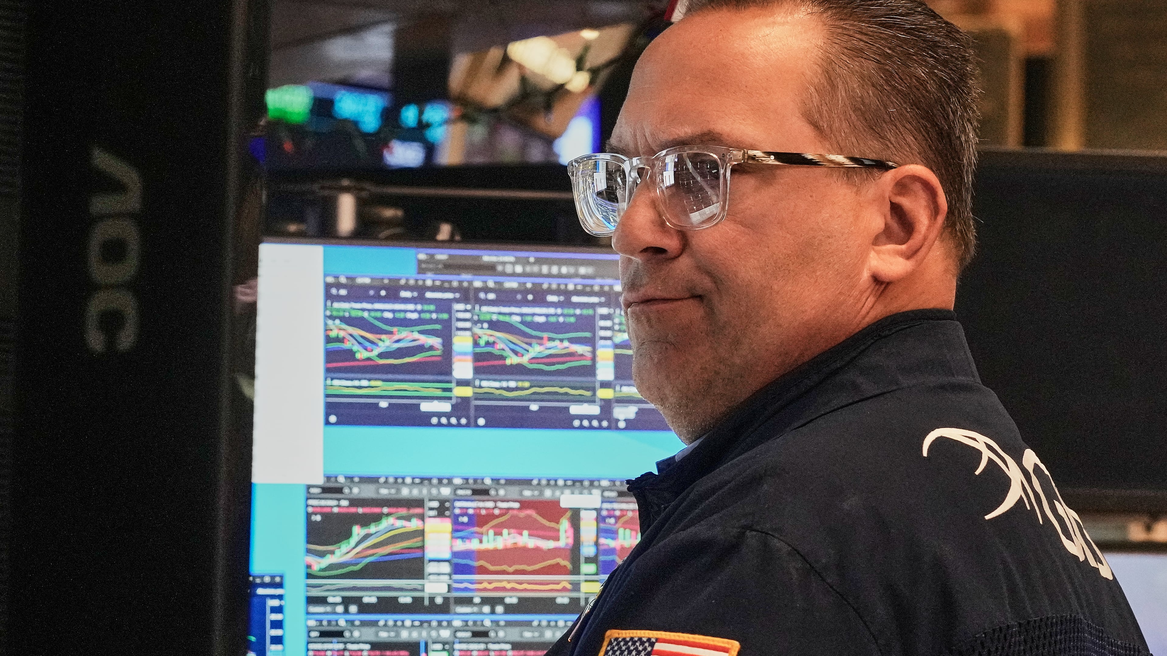 Specialist Anthony Matesic works at his post on the floor of the New York Stock Exchange, Thursday, April 30, 2026. (AP Photo/Richard Drew)