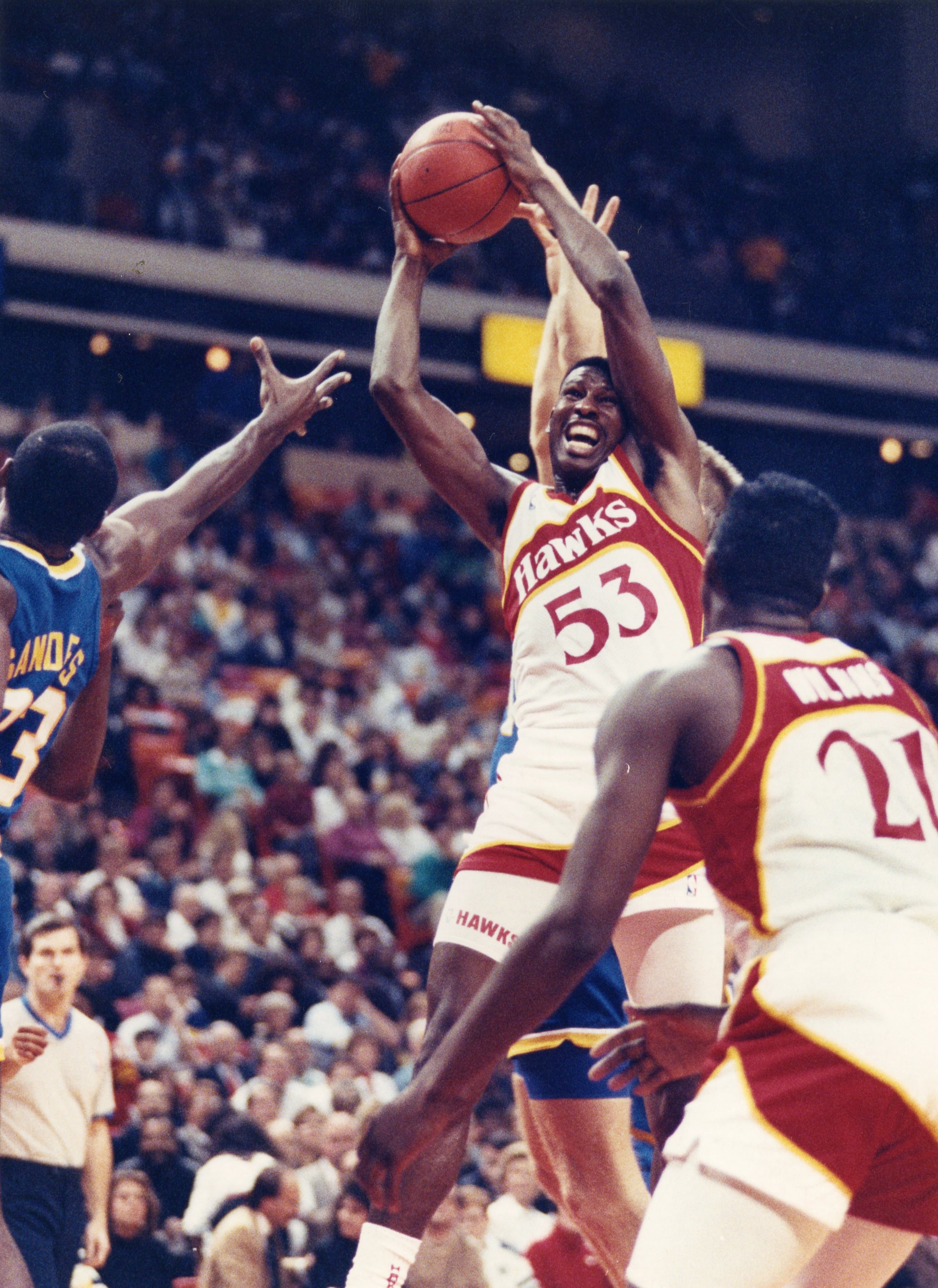 Cliff Levingston claims a rebound for the Hawks in 1989. AJC file photo