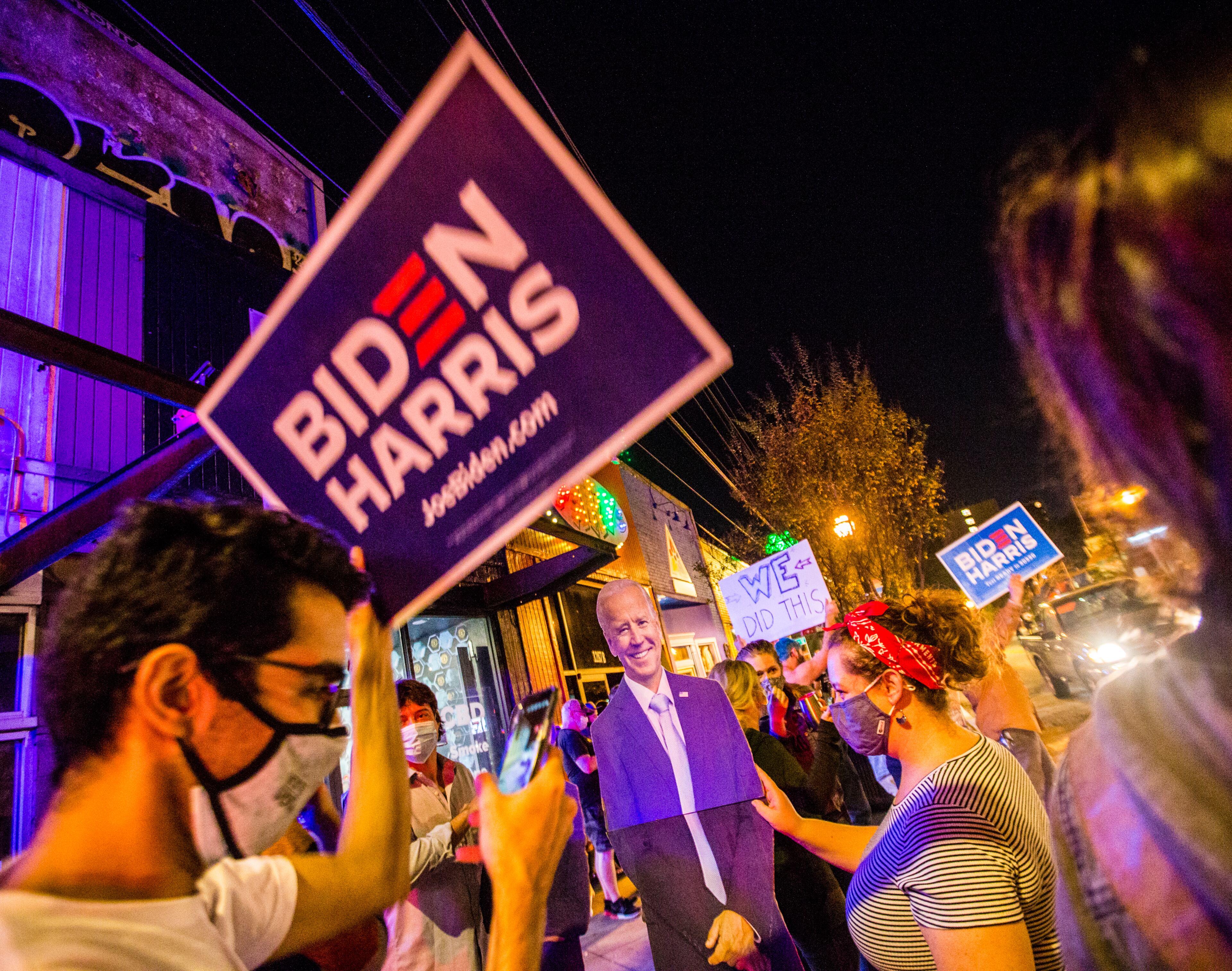 East Atlanta celebrates as election results become more clear and celebrations for President-Elect Joe Biden and VP Kamala Harris begin on Saturday, Nov 7, 2020. (Jenni Girtman for The Atlanta Journal-Constitution)
