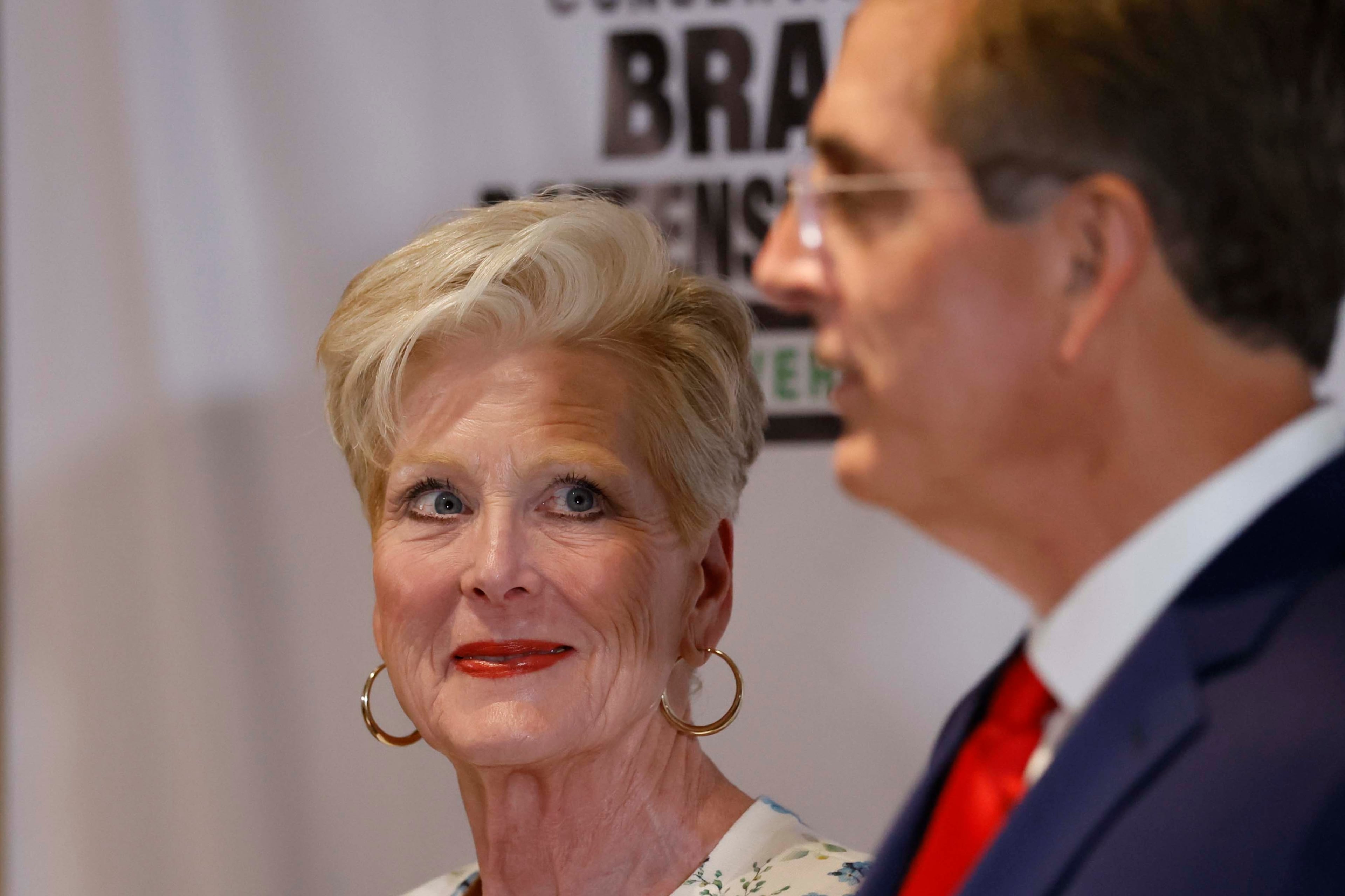 Tricia Raffensperger watches her husband, Secretary of State Brad Raffensperger, as he speaks to supporters during the primary election night watch party at the Waverly Hotel on Tuesday, May 19, 2026. (Miguel Martinez/AJC)