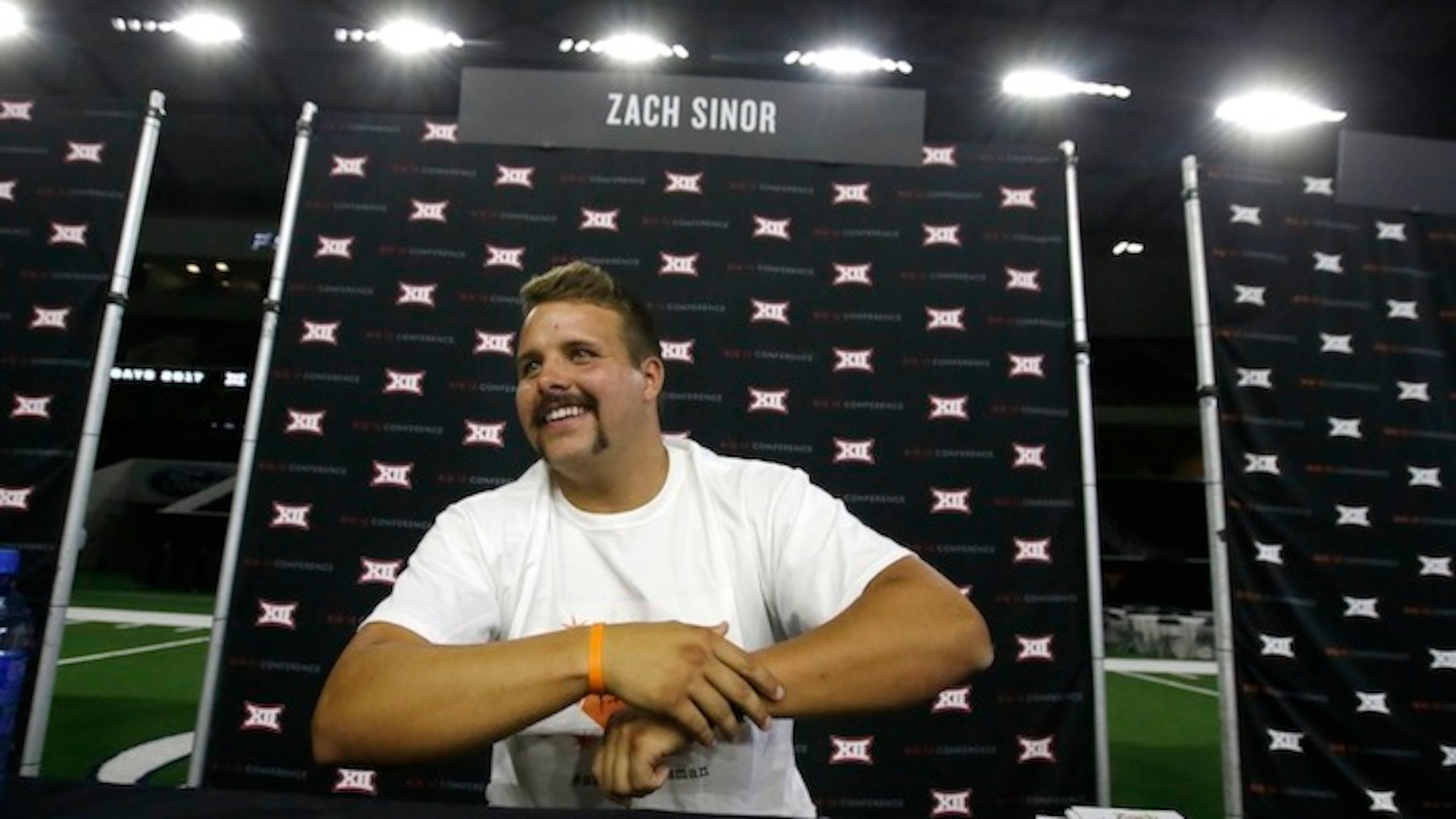 Oklahoma State punter Zach Sinor smiles while giving an interview during the Big 12 NCAA college football media day in Frisco, Texas, Tuesday, July 18, 2017. (AP Photo/LM Otero)