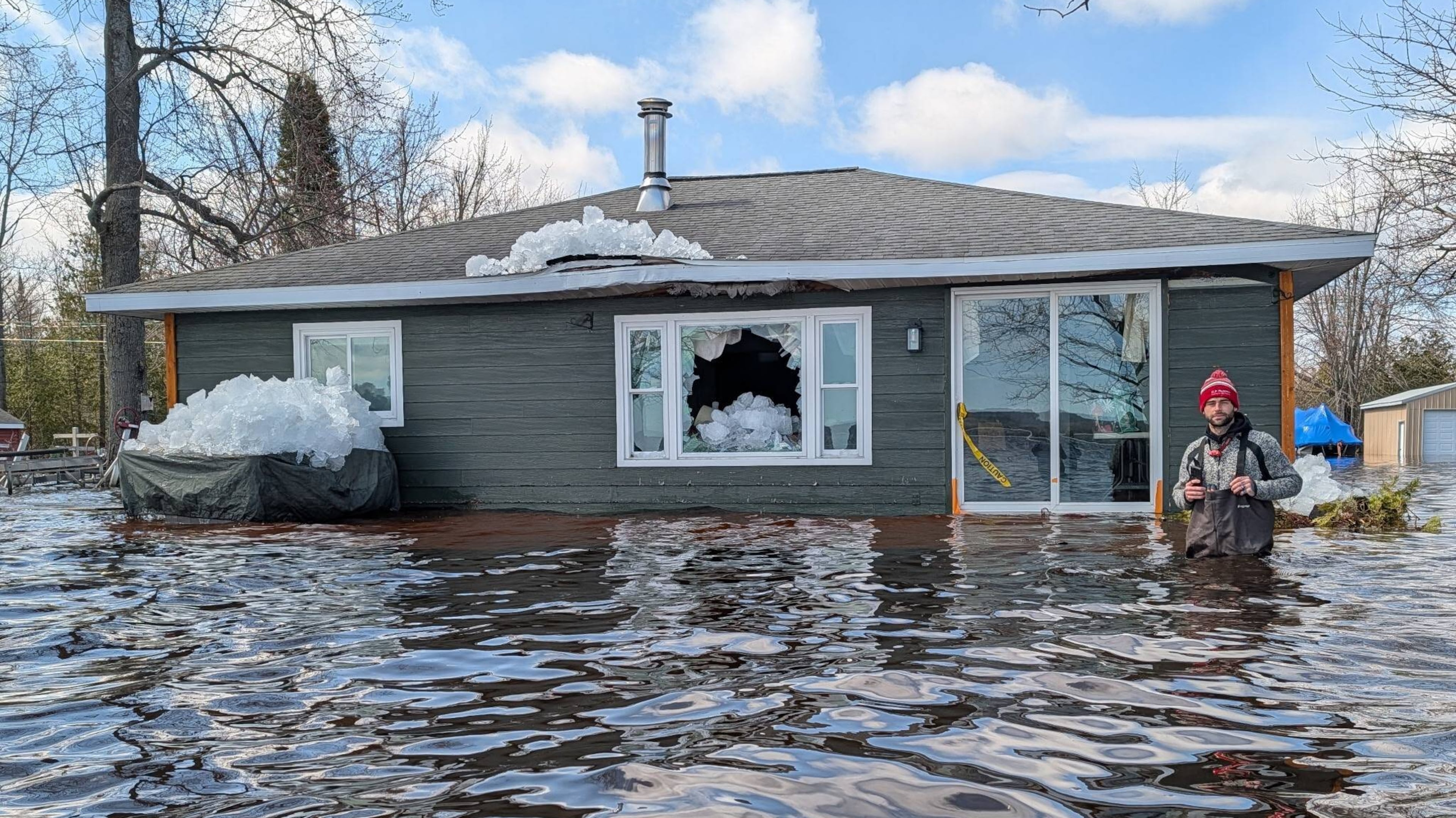 This image provided by Christopher Narsesian shows chunks of ice and flooding in Michigan’s Black Lake in the northeastern Lower Peninsula on April 19, 2026. (Christopher Narsesian via AP)