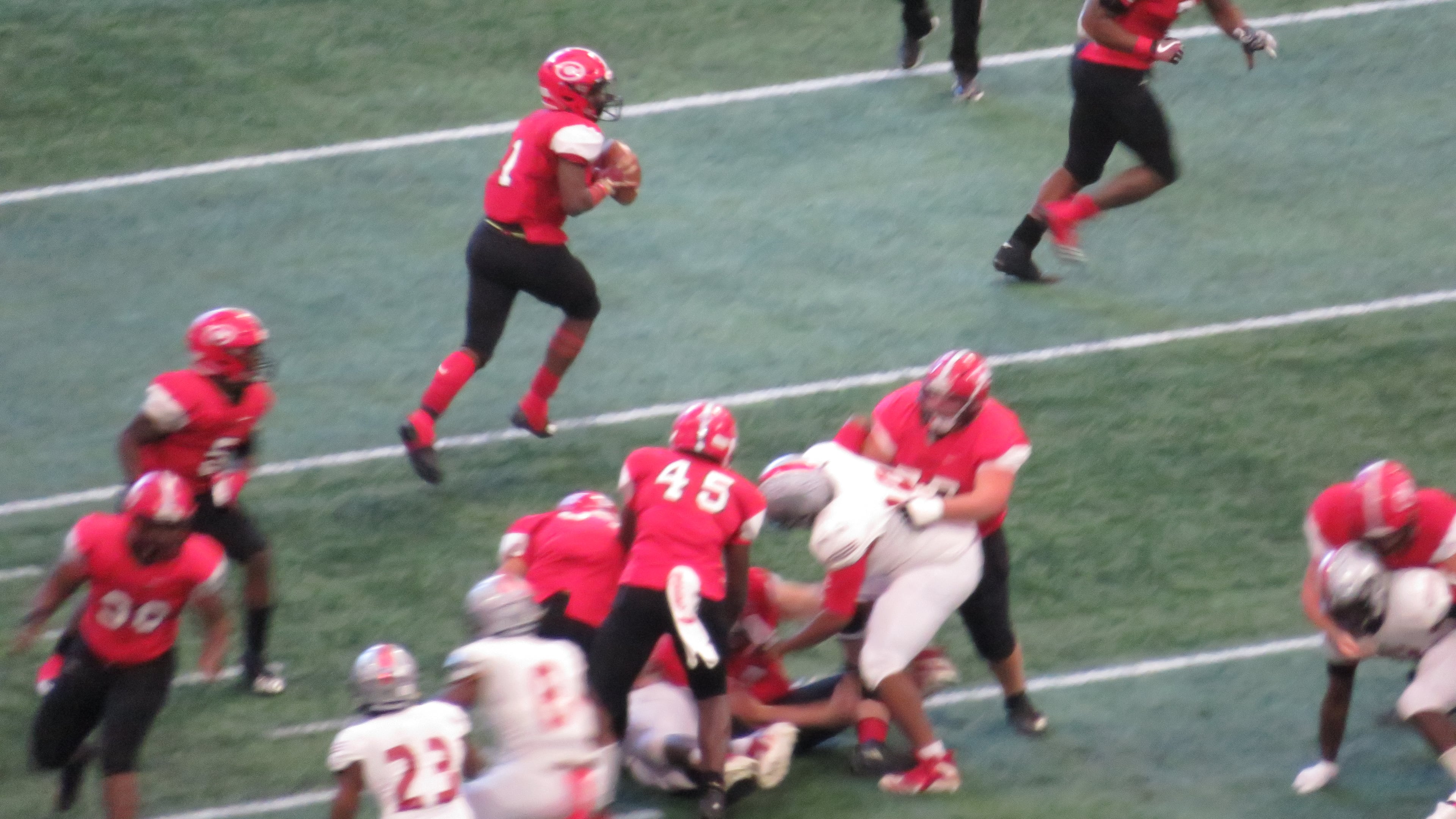 Tyler Morehead of the Clinch County Panthers scrambles outside of the pocket during the GHSA Class A-Public championship game Tuesday, Dec. 11, 2018 at Mercedes-Benz Stadium in Atlanta. (Adam Krohn/Special)