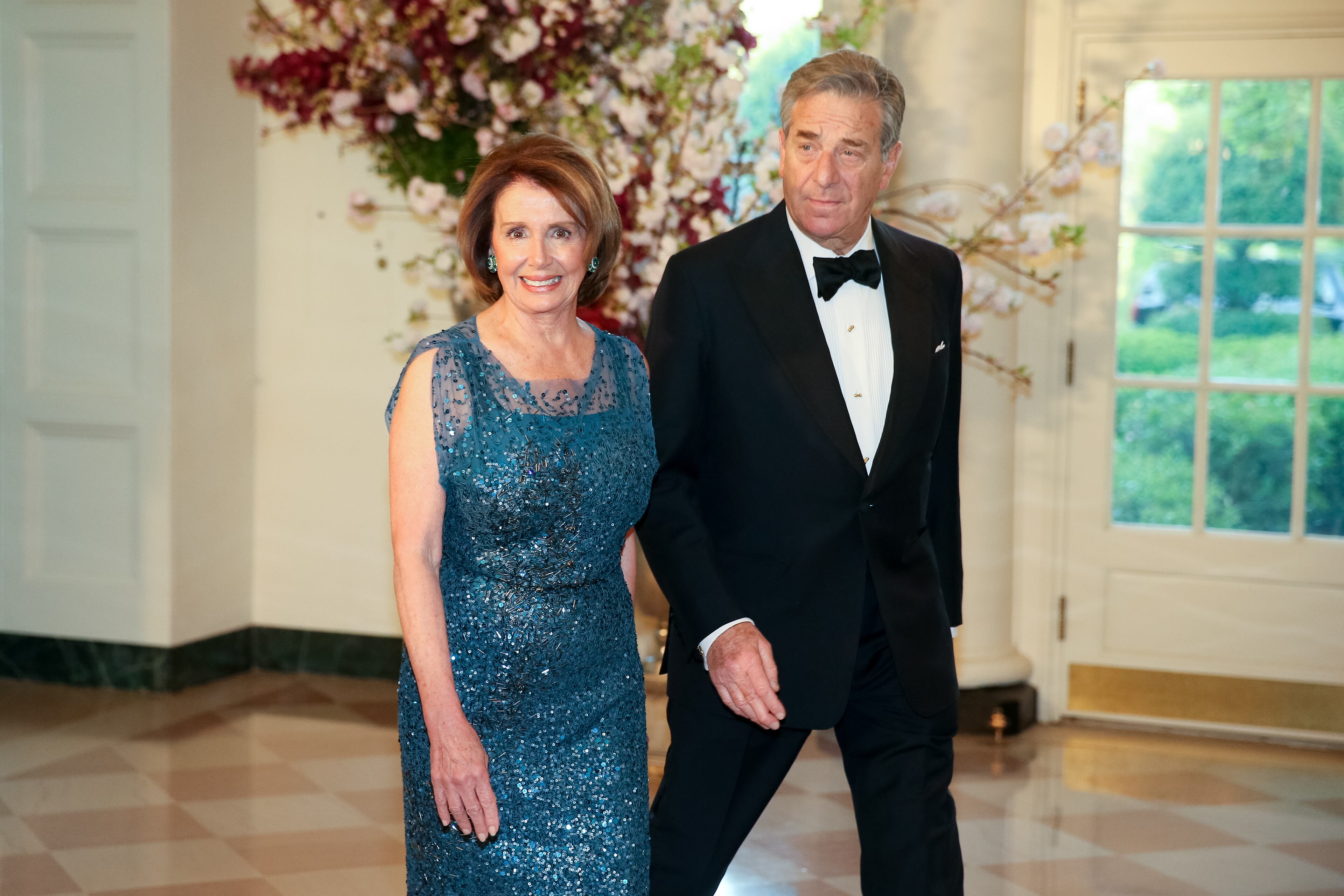 House Minority Leader Nancy Pelosi of Calif., and her husband, Paul, arrive for a state dinner for Japanese Prime Minister Shinzo Abe, Tuesday, April 28, 2015, at the White House in Washington. (AP Photo/Andrew Harnik)