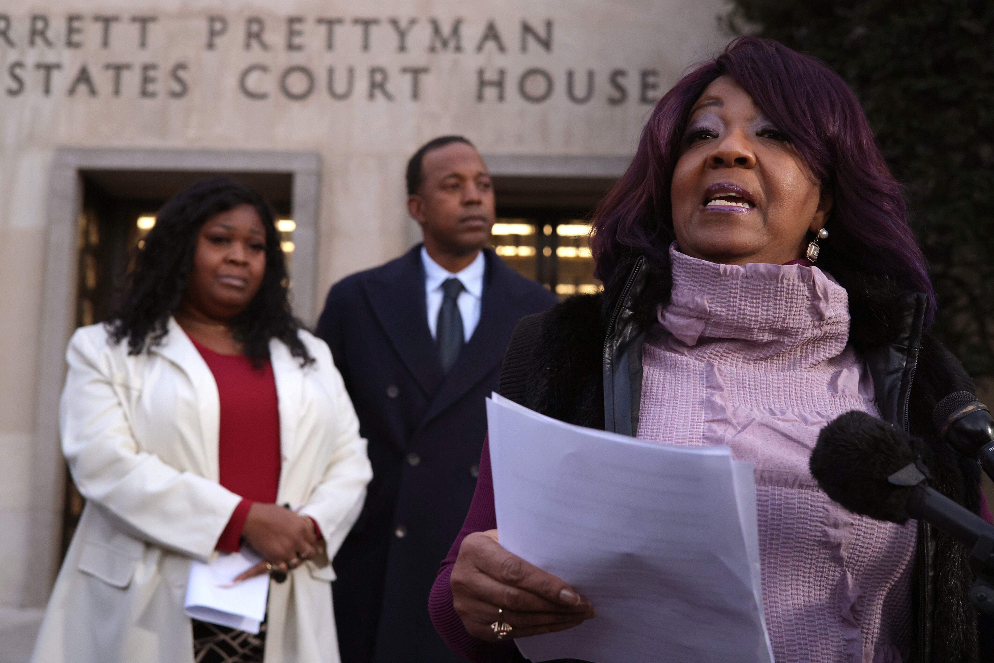 Georgia election workers Ruby Freeman and her daughter, Shaye Moss, speak outside of the E. Barrett Prettyman U.S. District Courthouse on Friday, Dec. 15, 2023, in Washington, D.C. A jury has ordered Rudy Giuliani, the former personal lawyer for former President Donald Trump, to pay $148 million in damages to the pair. (Alex Wong/Getty Images/TNS)