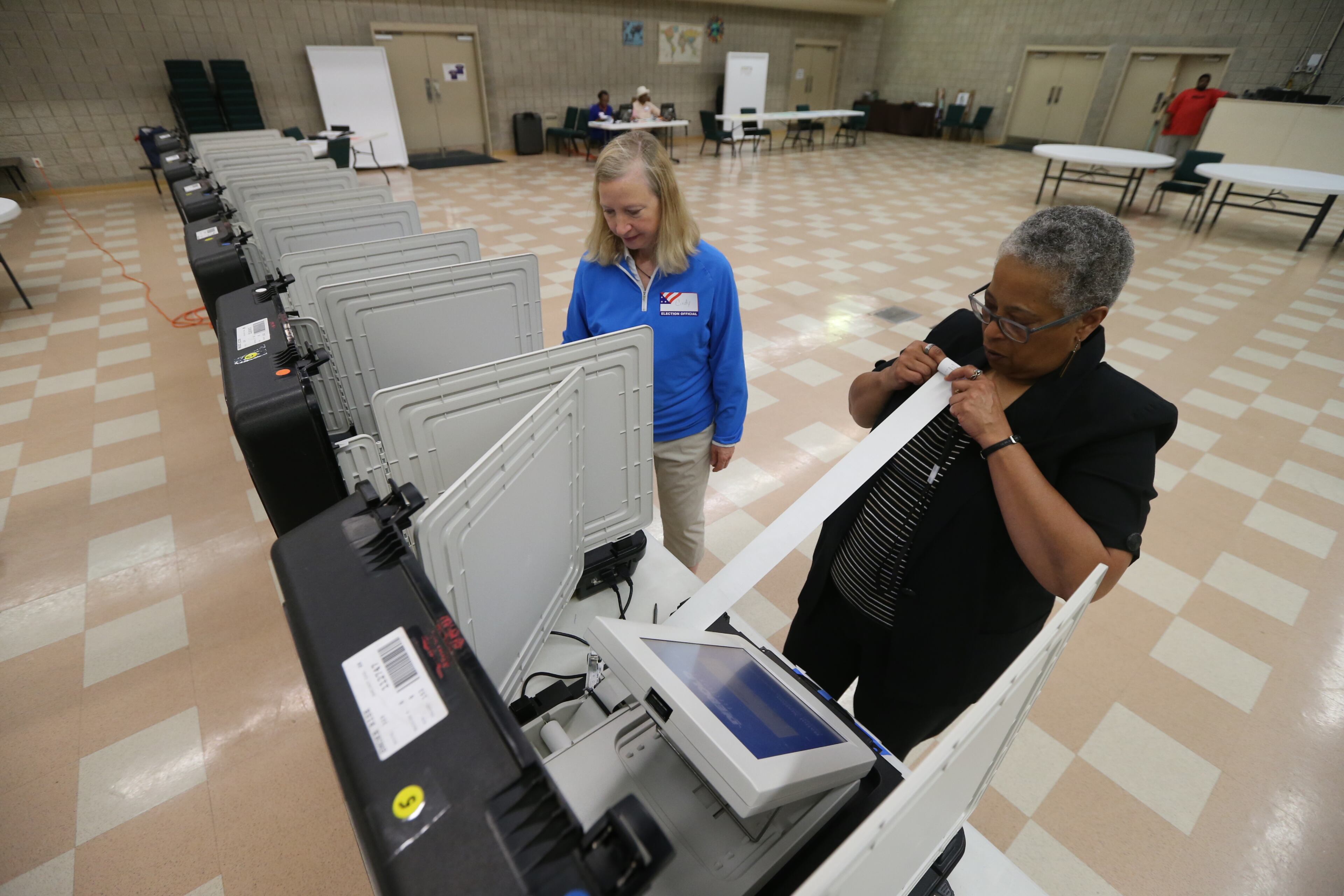 Poll workers set the scene at Mt. Carmel in DeKalb on Tuesday, May 24, 2016, for the primaries.