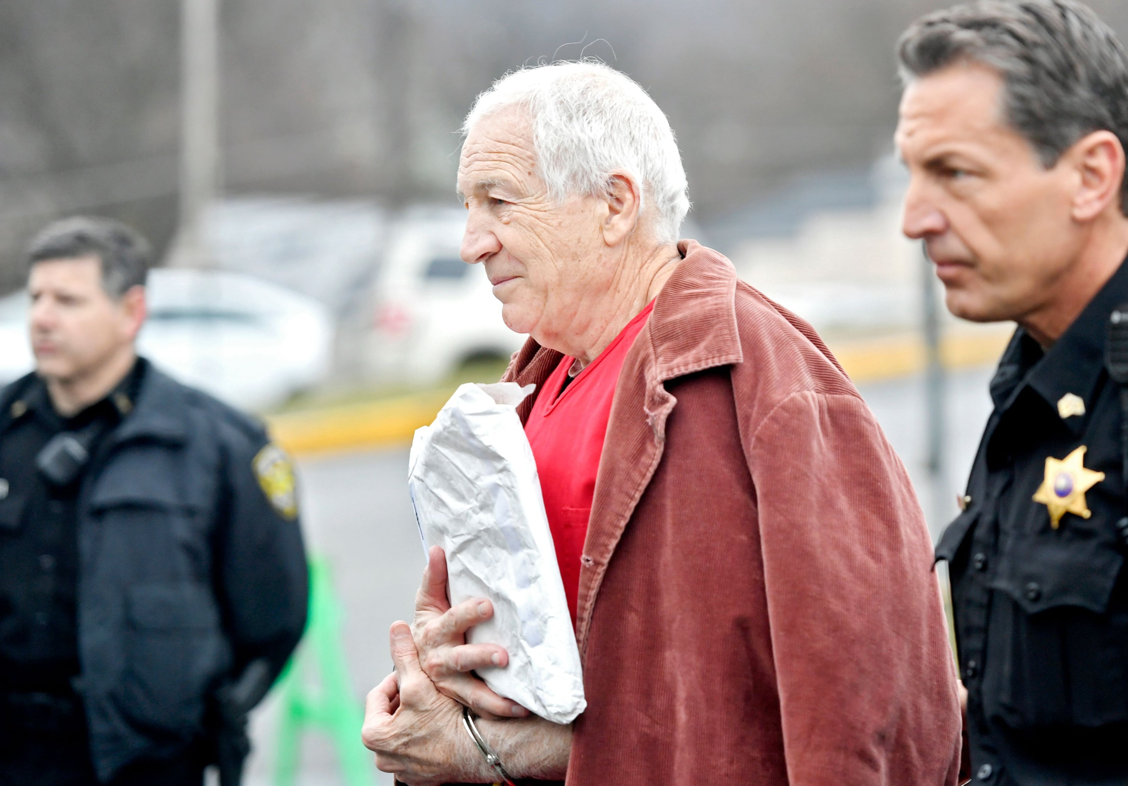 Former Penn State assistant football coach Jerry Sandusky arrives at the Centre County Courthouse for a post-conviction appeals hearing on March 24, 2017.