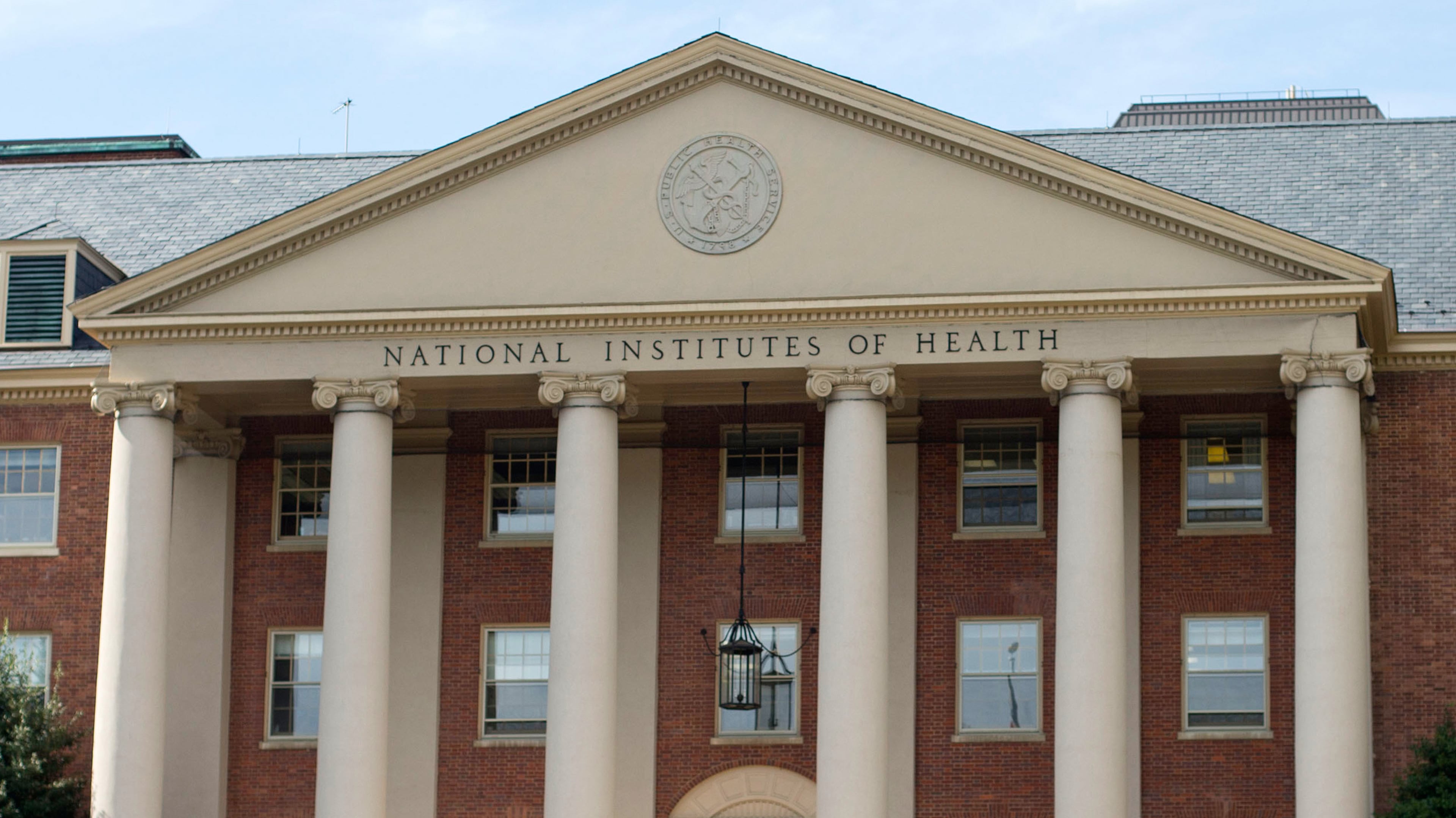 FILE - The National Institutes of Health's James Shannon building is seen on the agency's campus in Bethesda, Md., Oct. 24, 2014. (AP Photo/Pablo Martinez Monsivais, File)