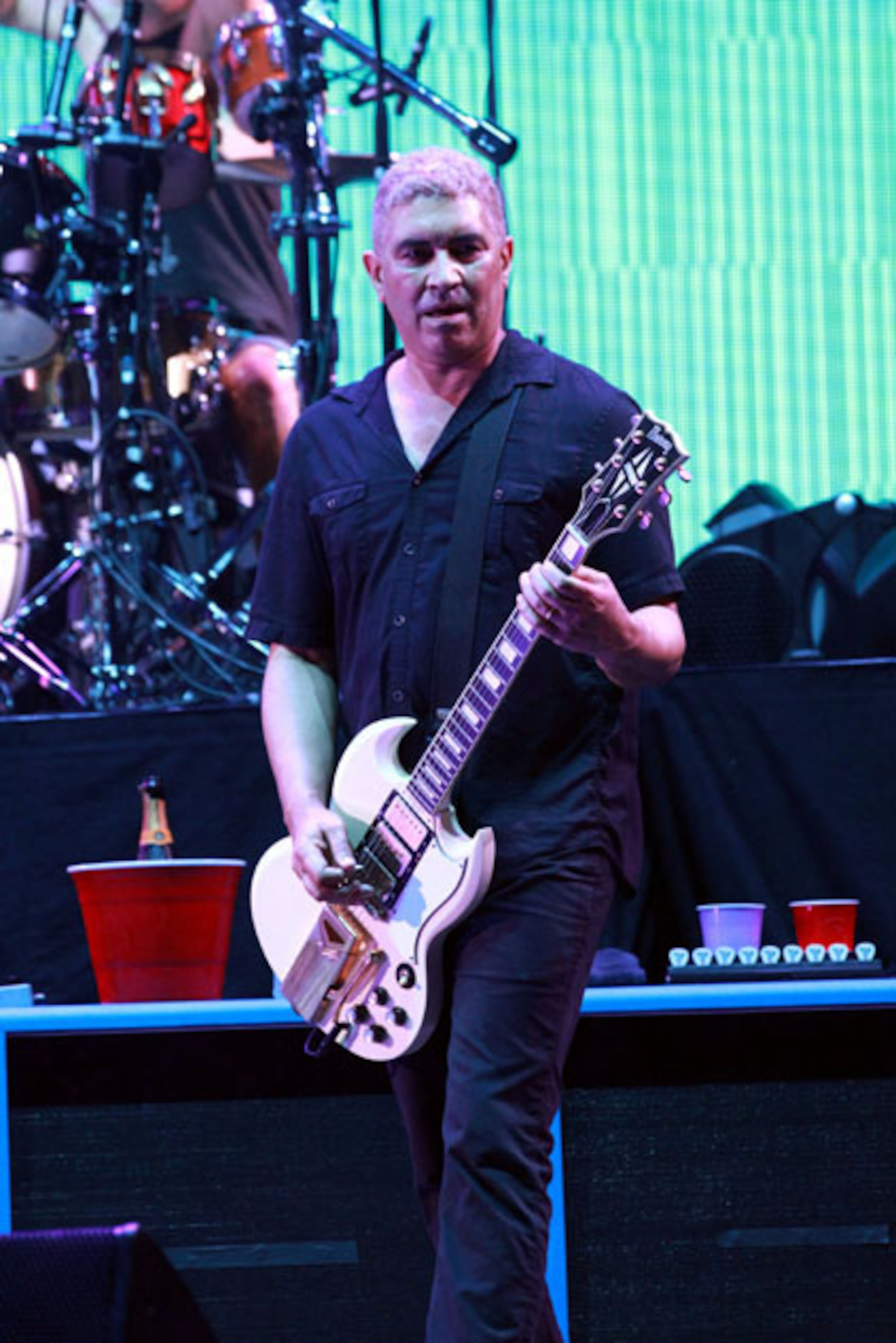 Guitarist Pat Smear, who was Nirvana's touring guitarist. Dave Grohl and the Foo Fighters packed over 20,000 fans into sold out Centennial Olympic Park Sunday night, October 4, 2015, with Gary Clark, Jr. opening the show. The light rain couldn't dampen the energy and spirit of the huge crowd. Grohl, who broke his leg while performing in Sweden in June, rocked out in a motorized throne, which was equipped with lights and carried numerous guitars. Robb D. Cohen/ RobbsPhotos.com