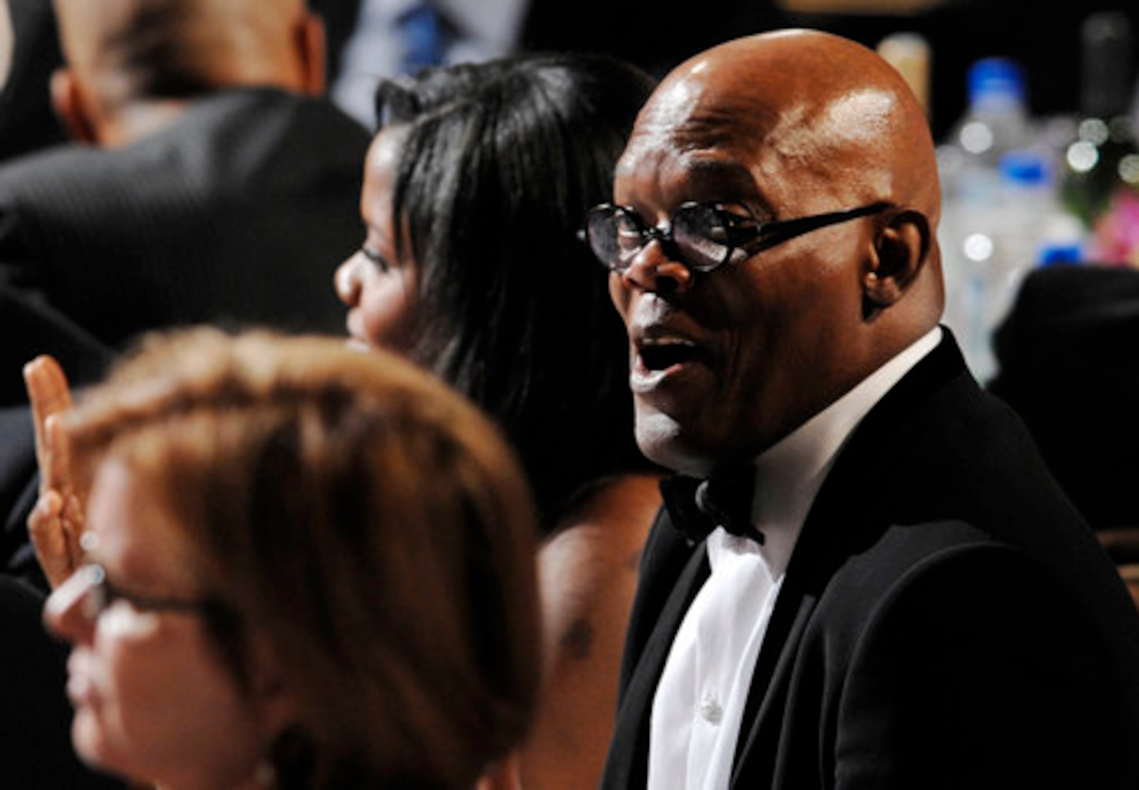 In the audience, Jackson reacts to Lopez's comments.