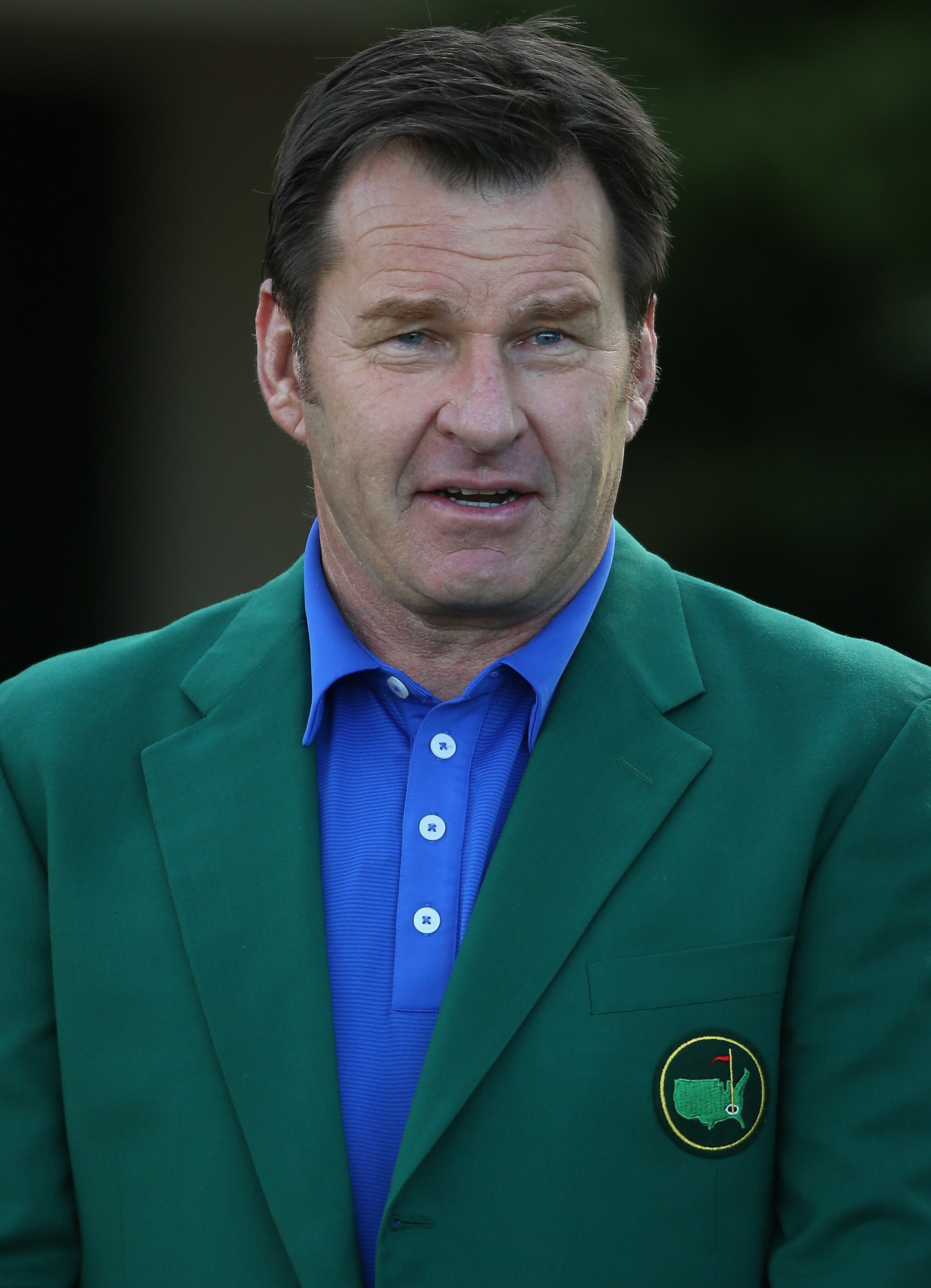 AUGUSTA, GA - APRIL 05: Sir Nick Faldo of England is pictured during the prize-giving for the Boys 7-9 division during the Drive, Chip and Putt Championship at Augusta National Golf Club on April 5, 2015 in Augusta, Georgia. (Photo by Andrew Redington/Getty Images)