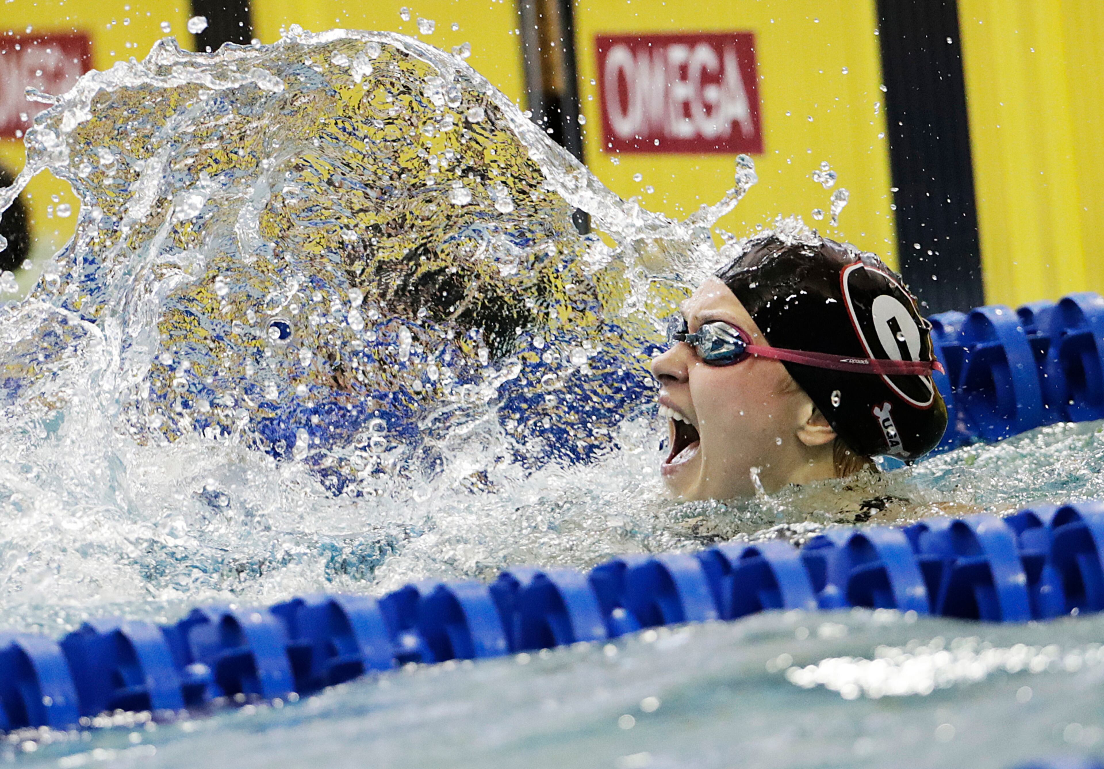 FREESTYLE CELEBRATION--Georgia's Olivia Smoliga celebrates after winning the 100-yard freestyle at the NCAA women's swimming and diving championships at Georgia Tech, Saturday, March 19, 2016, in Atlanta. (AP Photo/David Goldman)