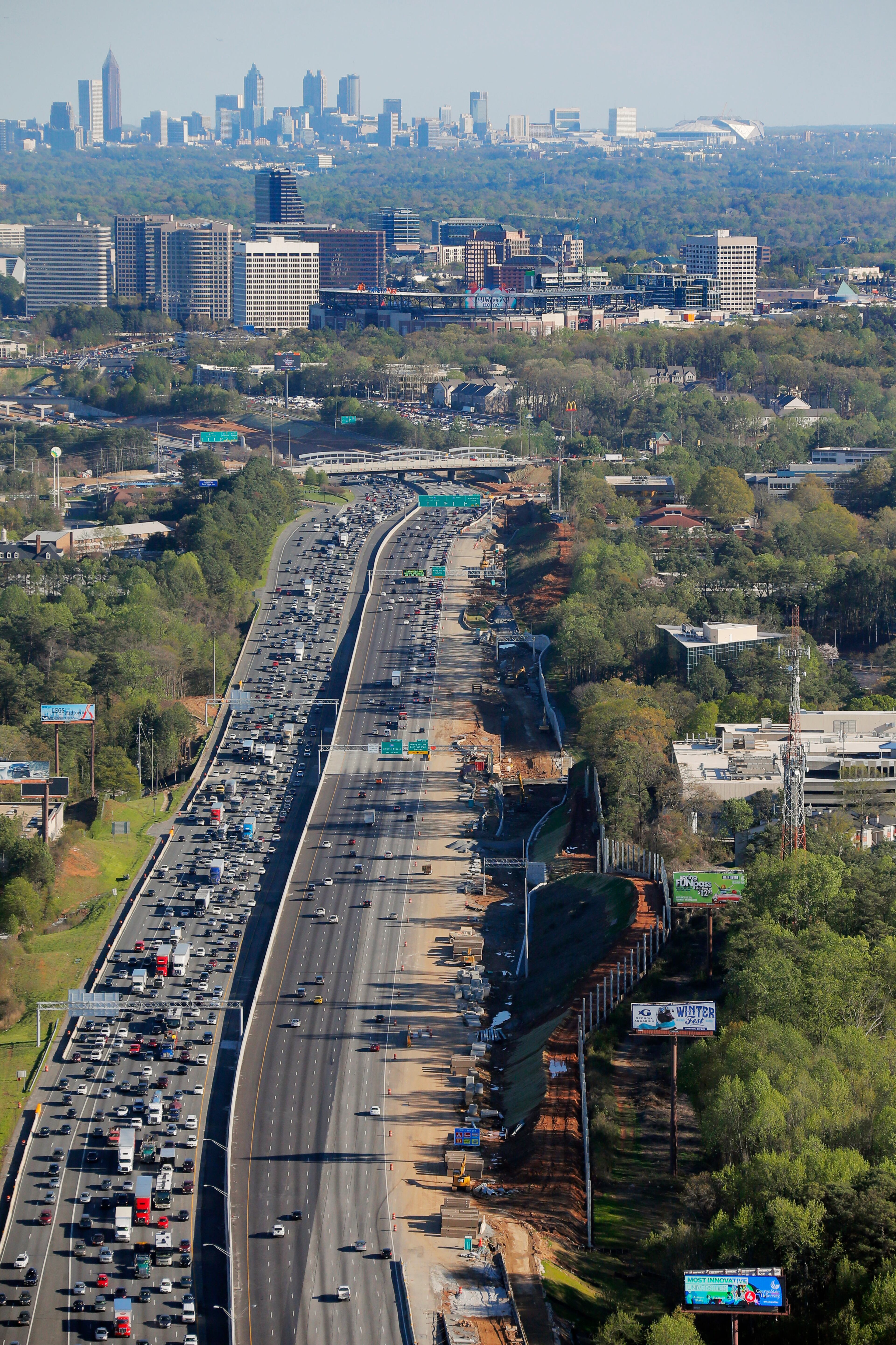 Mar. 31, 2017 - Atlanta - View of SunTrust park looking south with downtown Atlanta in the background and I-75 in the foreground. The Braves open their new stadium the day after a massive fire destroyed a section of I-85 in downtown Atlanta. BOB ANDRES /BANDRES@AJC.COM