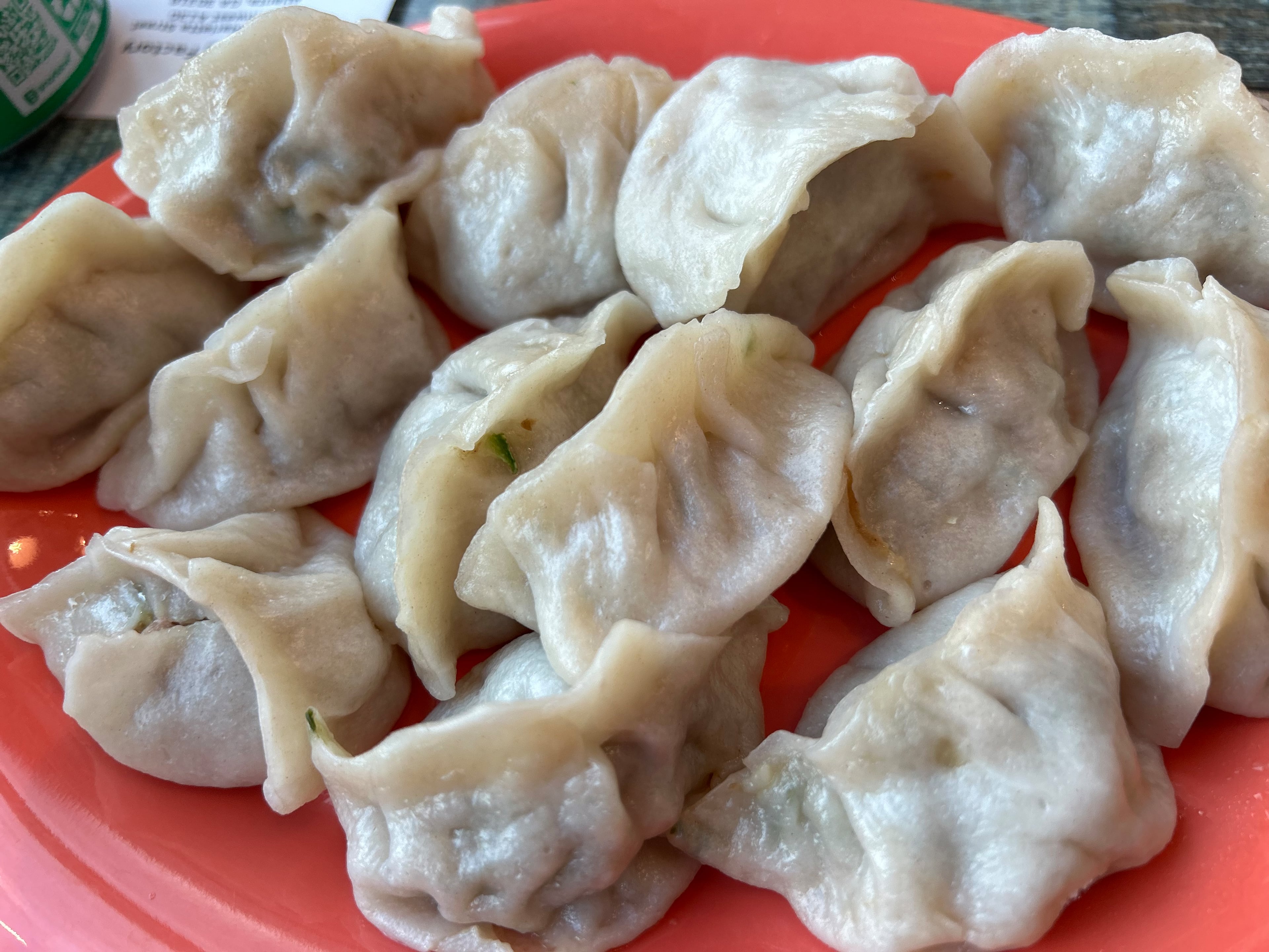 Boiled dumplings filled with pork and chives. (Candy Hom for the AJC)