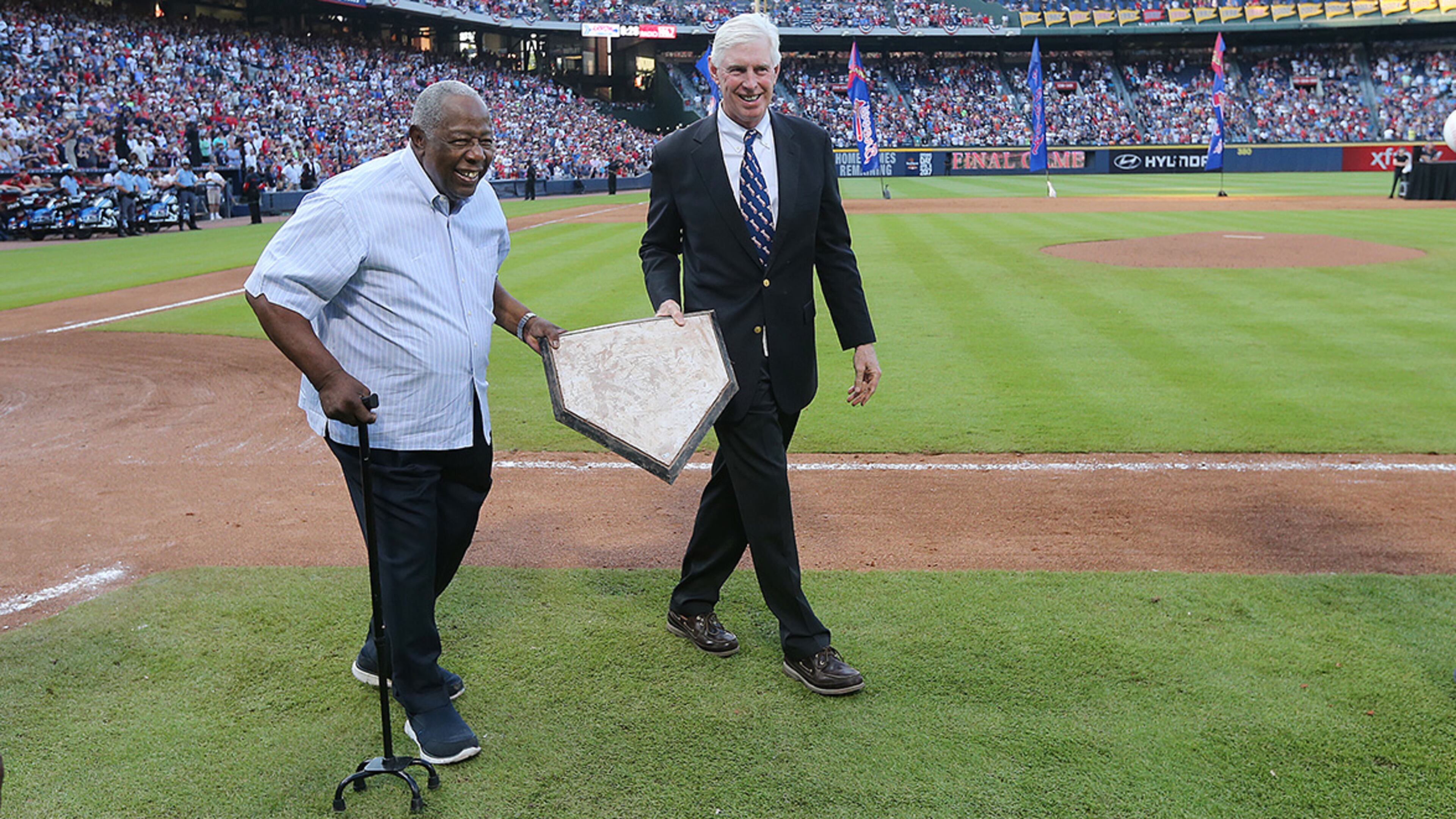October 02, 2016 Atlanta: Hank Aaron and Braves Chairman & CEO Terry McGuirk remove home plate at the conclusion of the final game at Turner Field to transfer it to the new stadium on Sunday, Oct. 2, 2016, in Atlanta. Curtis Compton /ccompton@ajc.com