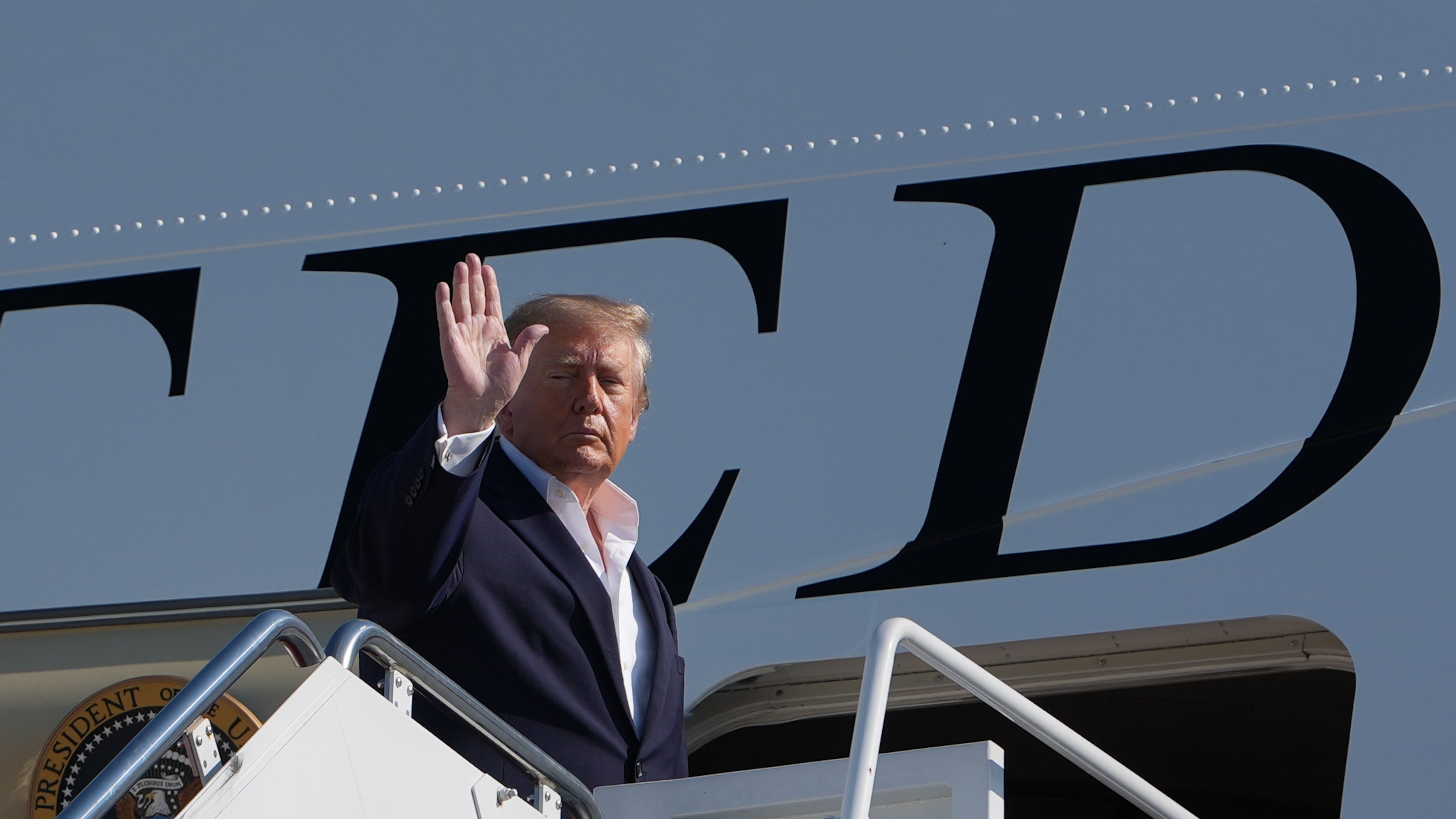 President Donald Trump waves as he boards Air Force One, Tuesday, Oct. 27, 2026, at Joint Base Andrews, Md. (AP Photo/Alex Brandon)