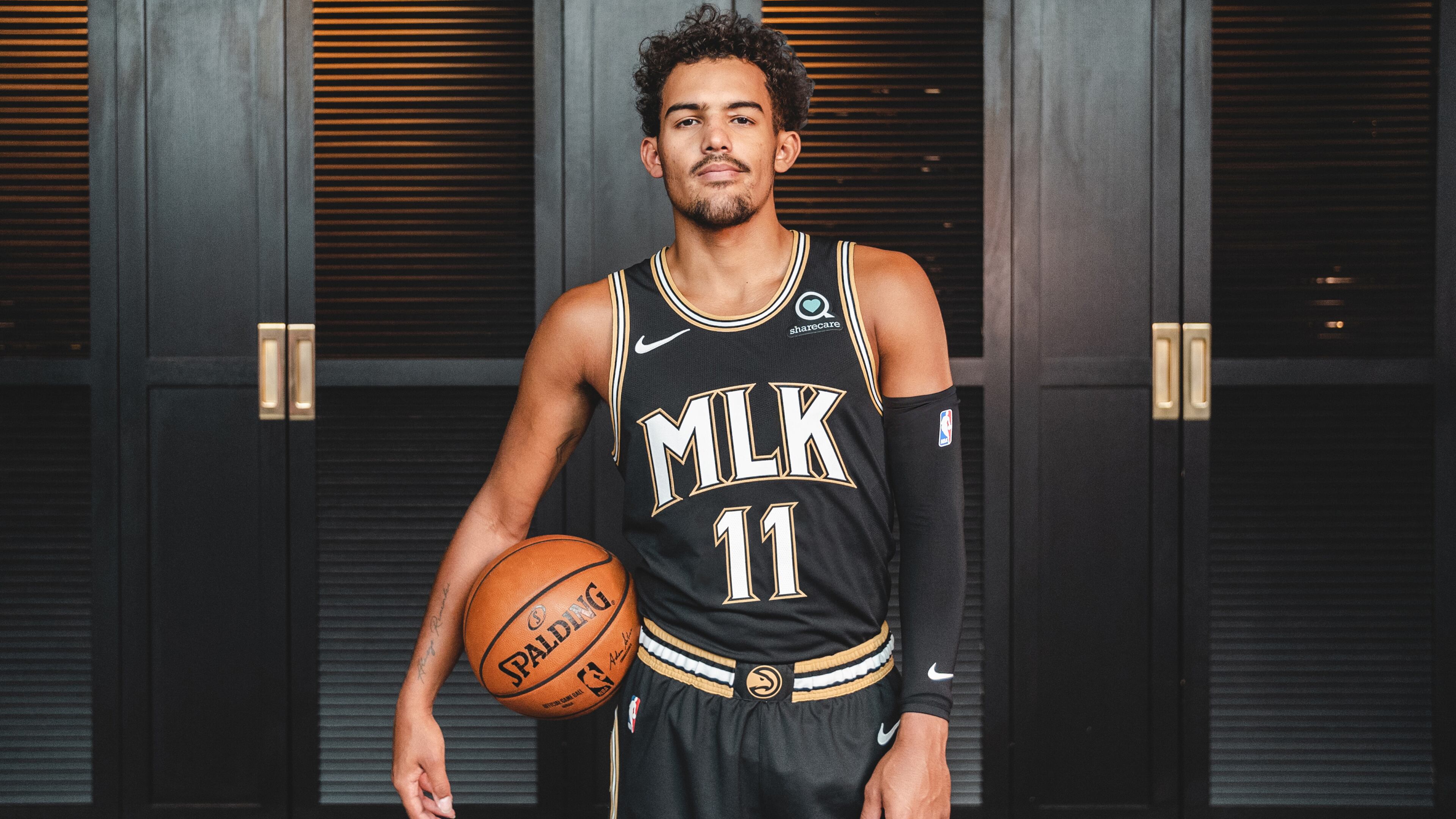 Hawks guard Trae Young models Atlanta's 2020-21 City Edition uniform, which honors the Rev. Martin Luther King Jr.