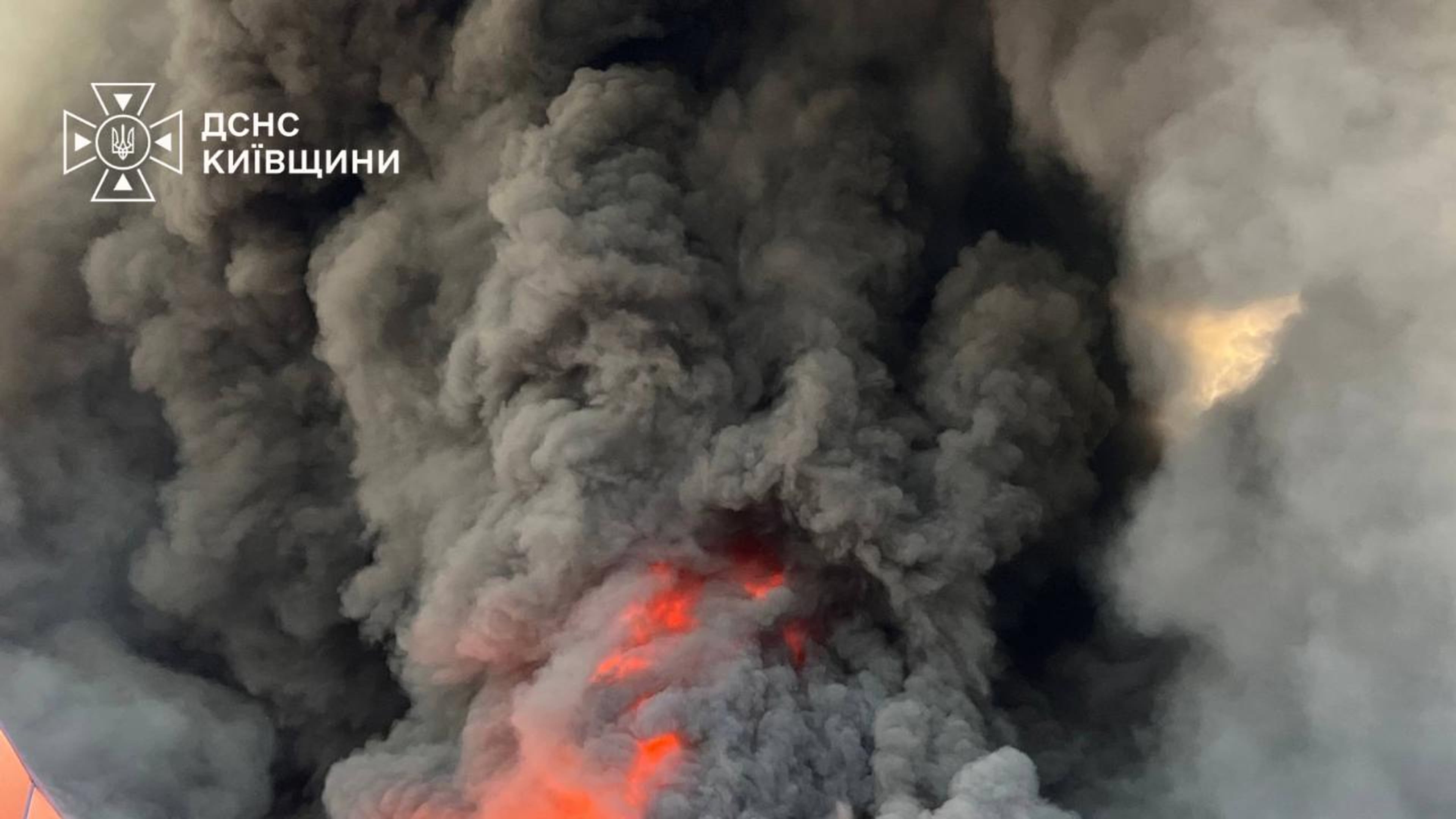 In this photo provided by the Ukrainian Emergency Service, firefighters put out a fire in a warehouse following a Russian drone attack near Kyiv, Ukraine, Saturday, Aug. 29, 2026. (Ukrainian Emergency Service via AP)