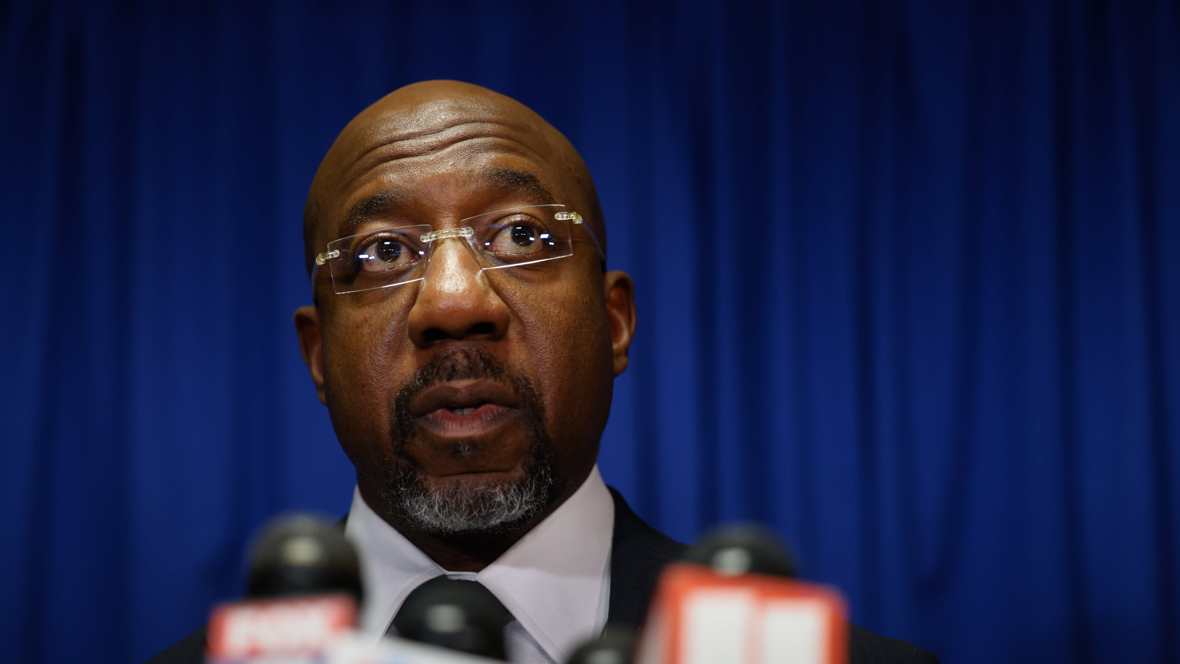 Democratic U.S. Sen. Raphael Warnock speaks at press conference before the state legislature convenes for a special session in Atlanta on June 17, 2026. (Arvin Temkar/AJC)