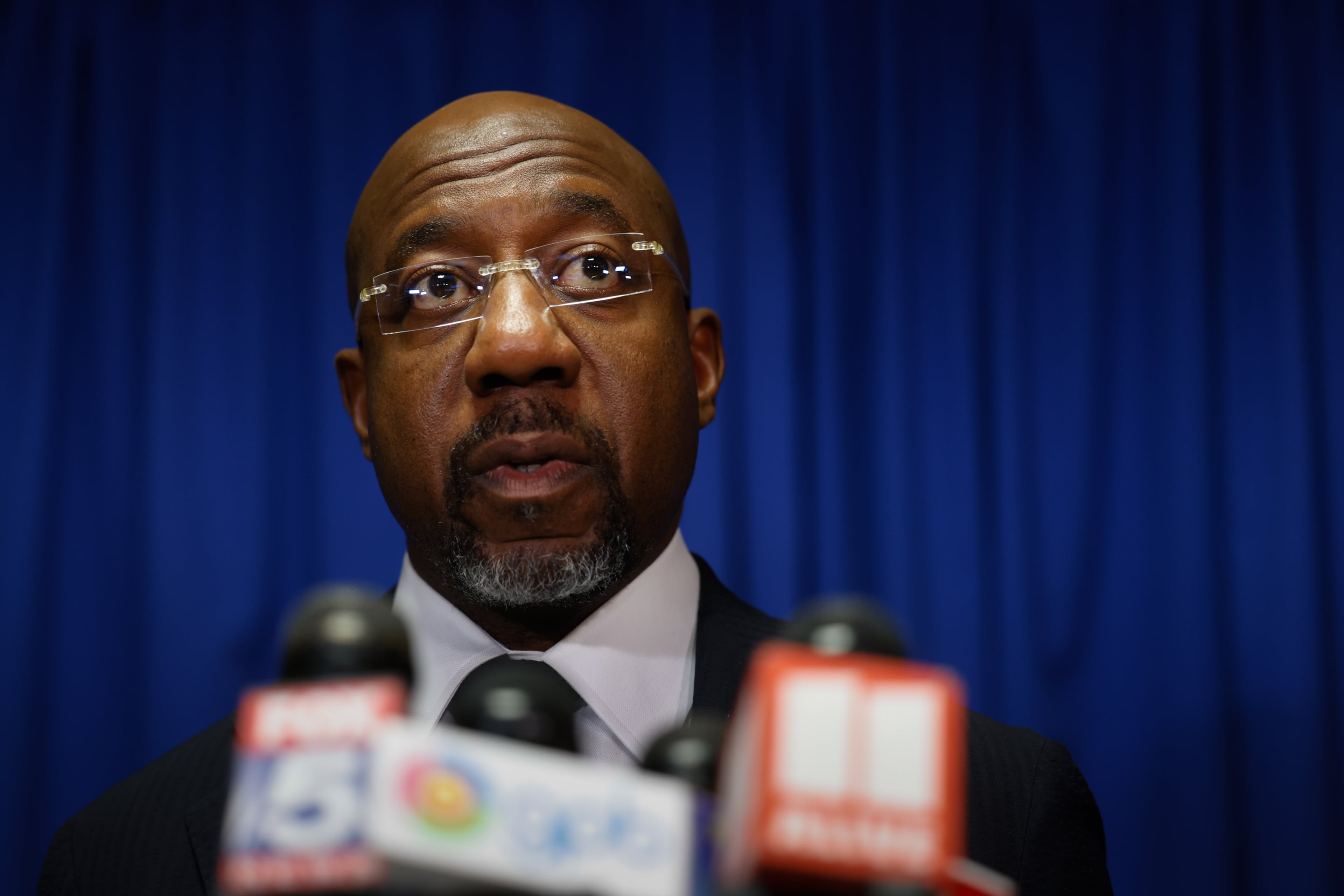 Democratic U.S. Sen. Raphael Warnock speaks at a press conference before the state legislature convened for a special session in Atlanta on June 17, 2026. (Arvin Temkar/AJC)