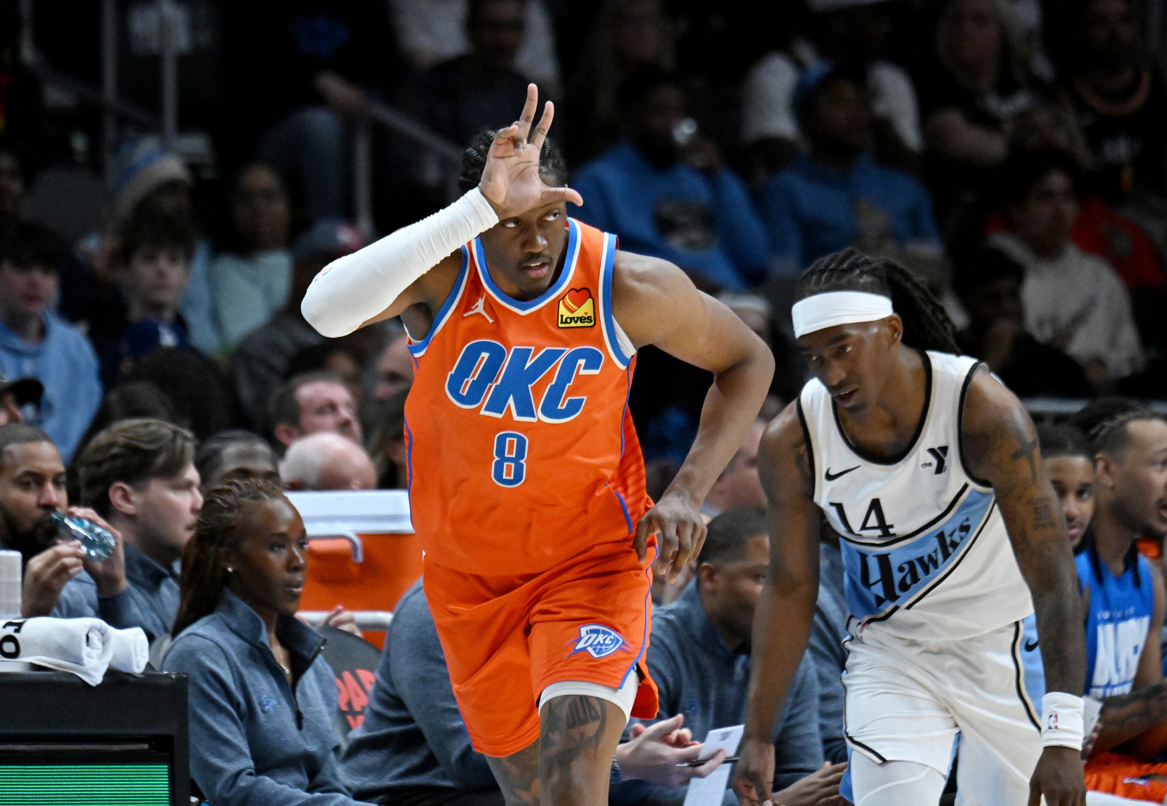 Oklahoma City Thunder forward Jalen Williams (8) reacts after scoring a 3-point basket during the first half in an NBA basketball game at State Farm Arena, Friday, February 28, 2025, in Atlanta. (Hyosub Shin / AJC)