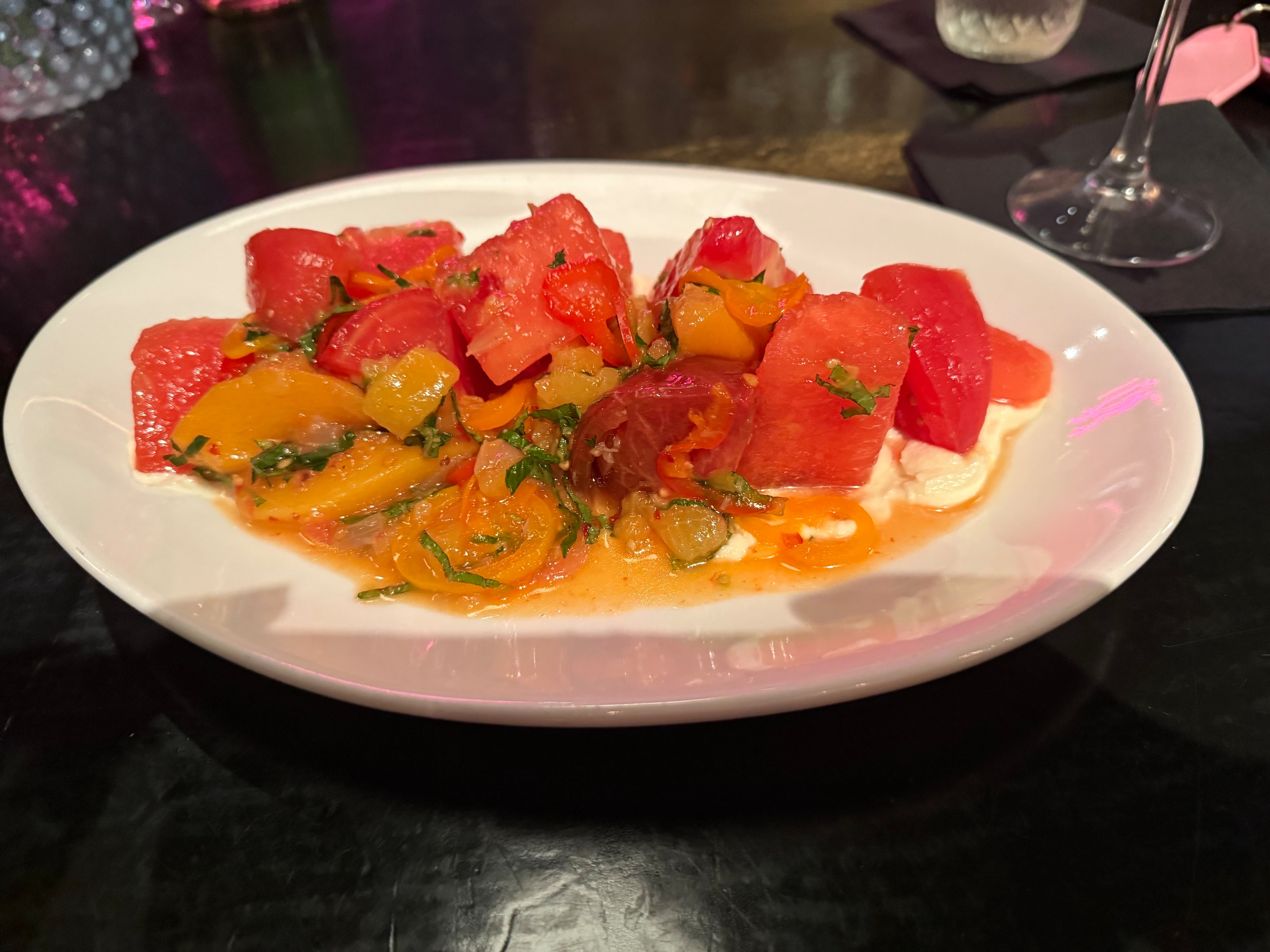 The summer salad at Kindred is a celebration of a summer harvest. (Angela Hansberger for AJC)