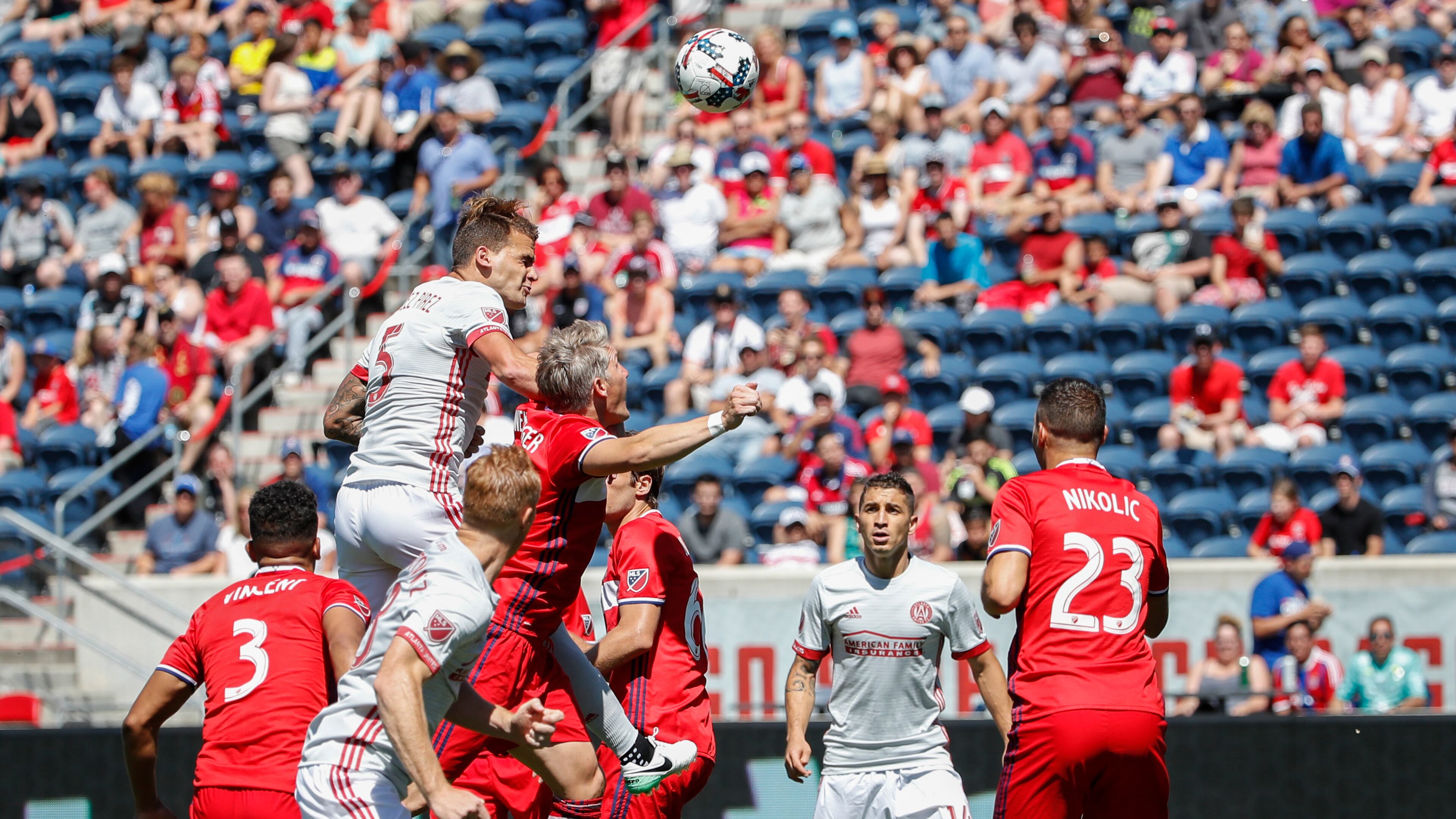 Atlanta United defender Leandro Gonzalez (5) Pirez tries to score over Chicago Fire midfielder Bastian Schweinsteiger (31) during the first half of an MLS soccer match, Saturday, June 10, 2017, in Bridgeview, Ill. (AP Photo/Kamil Krzaczynski)