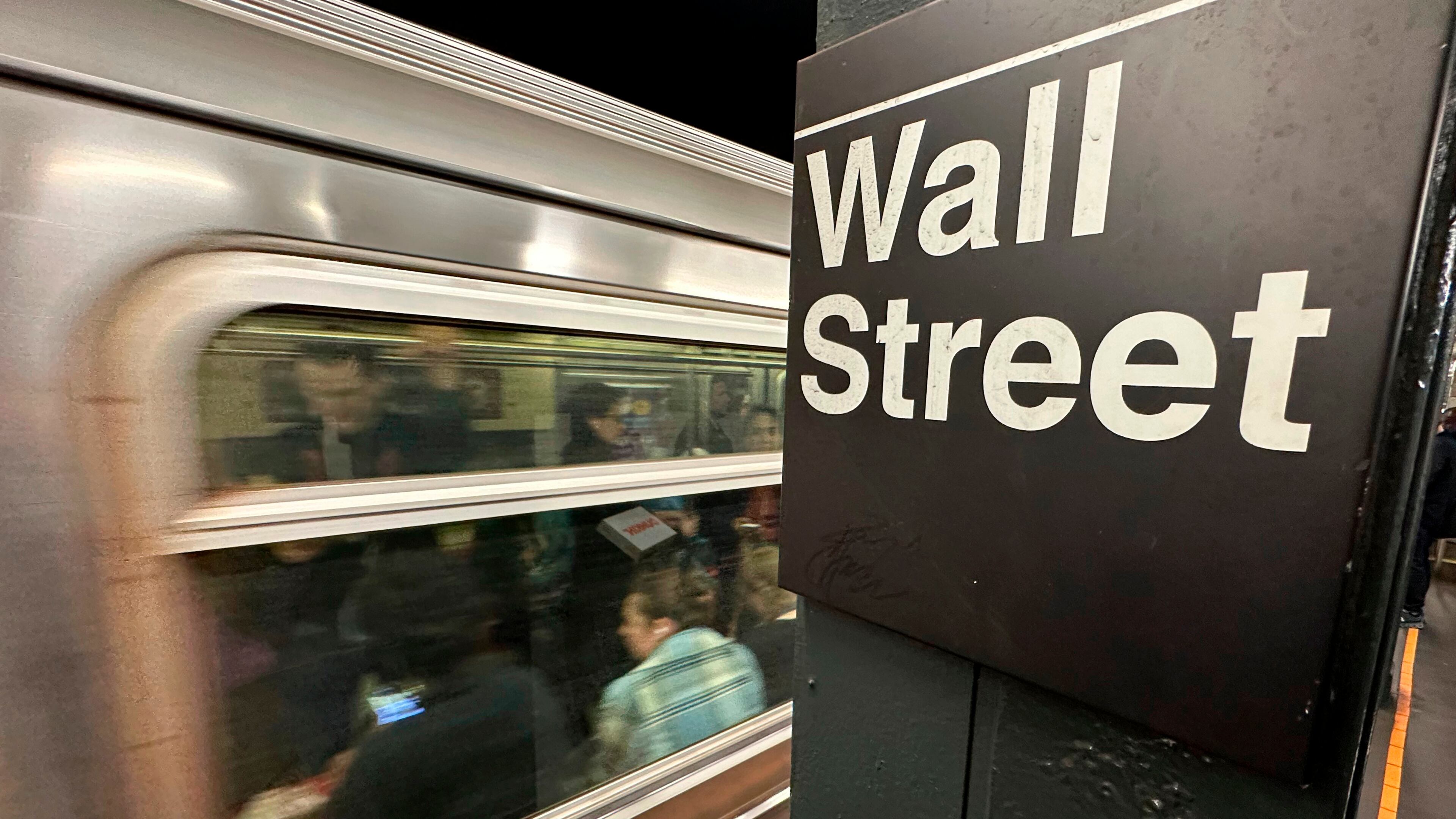 FILE - A train arrives at a Wall Street subway station in New York's Financial District on Nov. 5, 2024. (AP Photo/Peter Morgan, File)