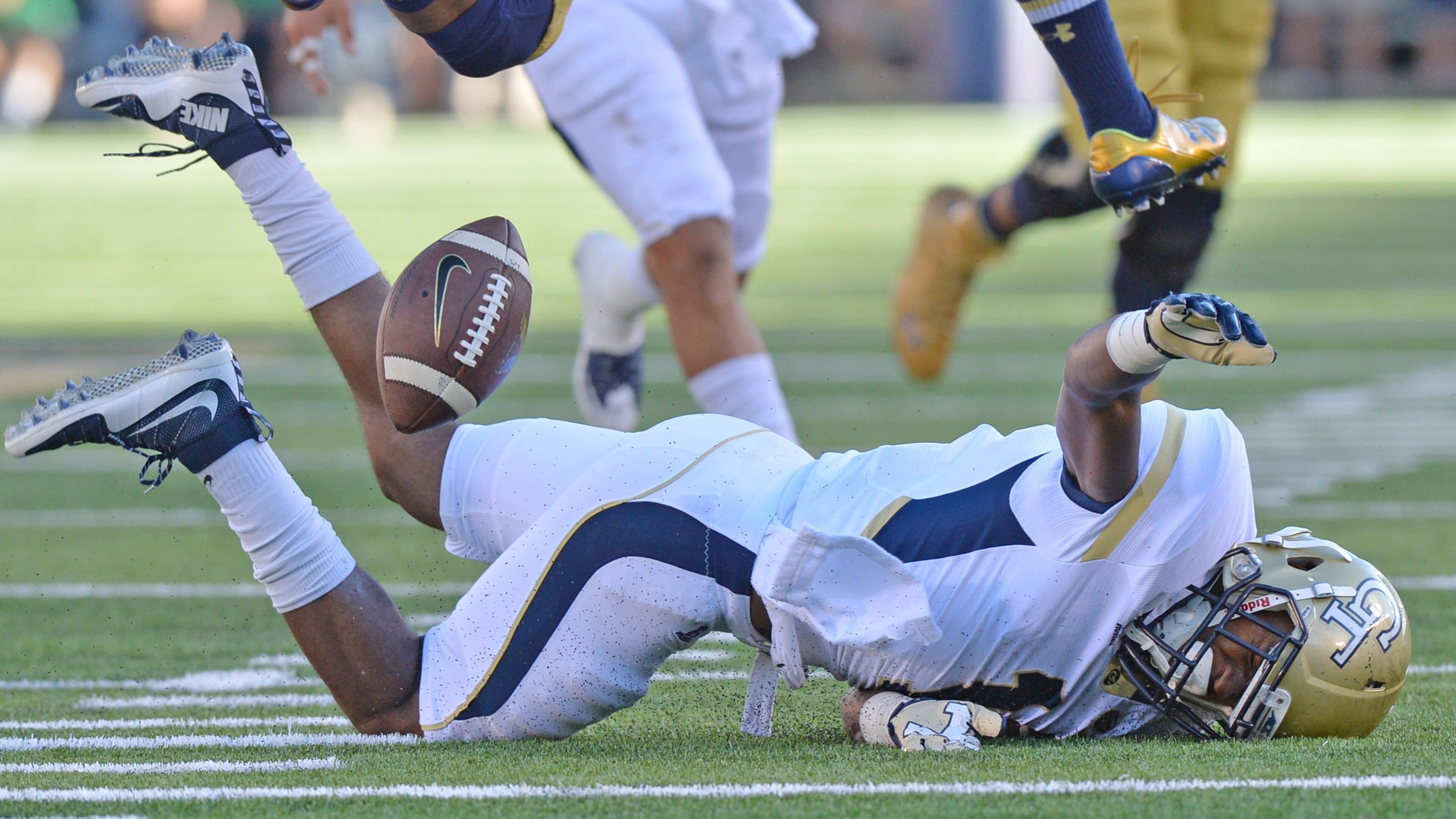 September 19, 2015 South Bend, Indiana - Georgia Tech Yellow Jackets running back Qua Searcy (1) fumbles the ball in the second half at Notre Dame Stadium in South Bend, Indiana on Saturday, September 19, 2015. Georgia Tech Yellow Jackets lost the game 30-22. HYOSUB SHIN / HSHIN@AJC.COM