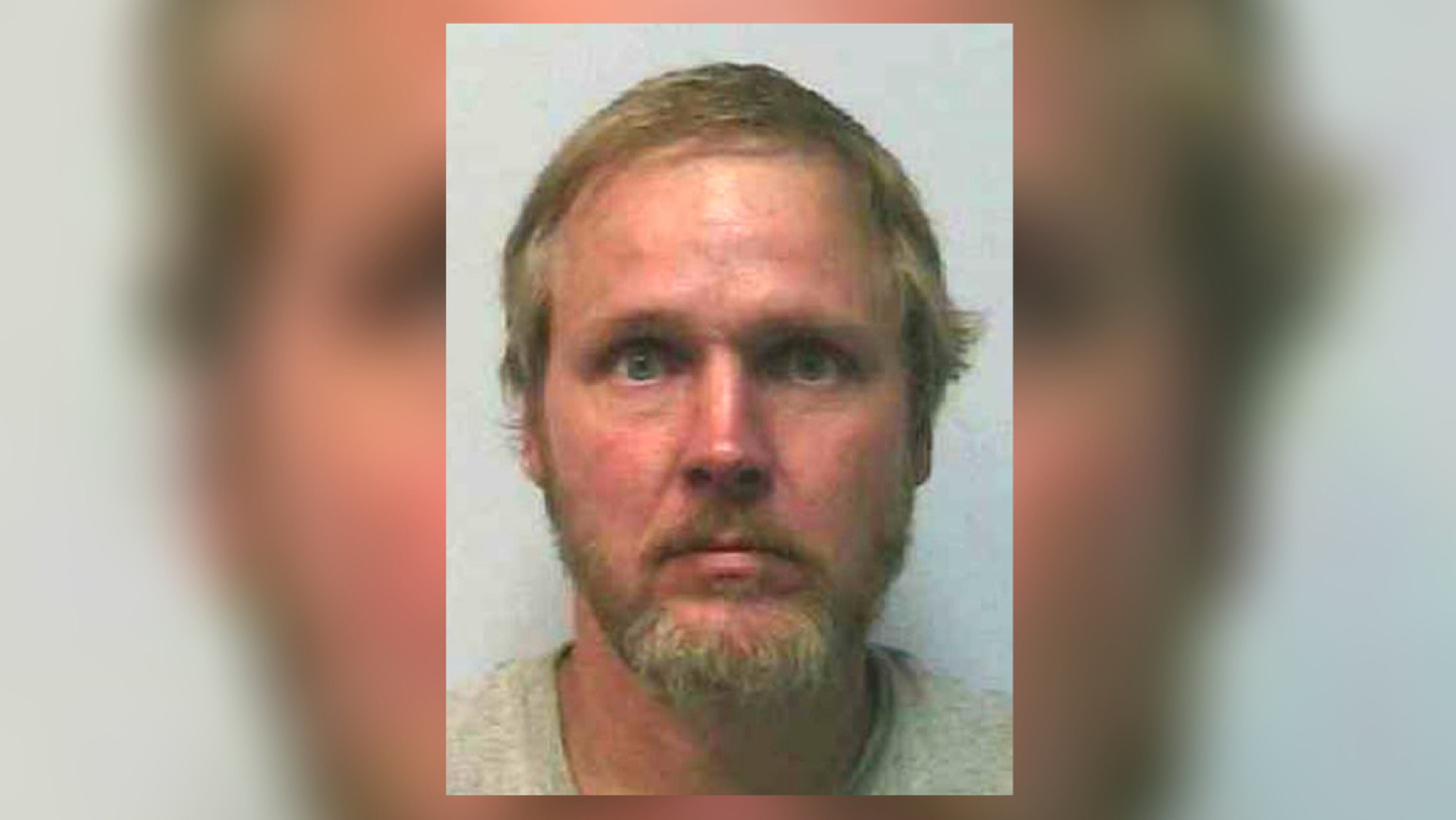 Larry Steven Grogan, 50, has been charged with the murder of mail carrier Asa “Junior” Wood Jr. He's shown in a 2005 file photo.