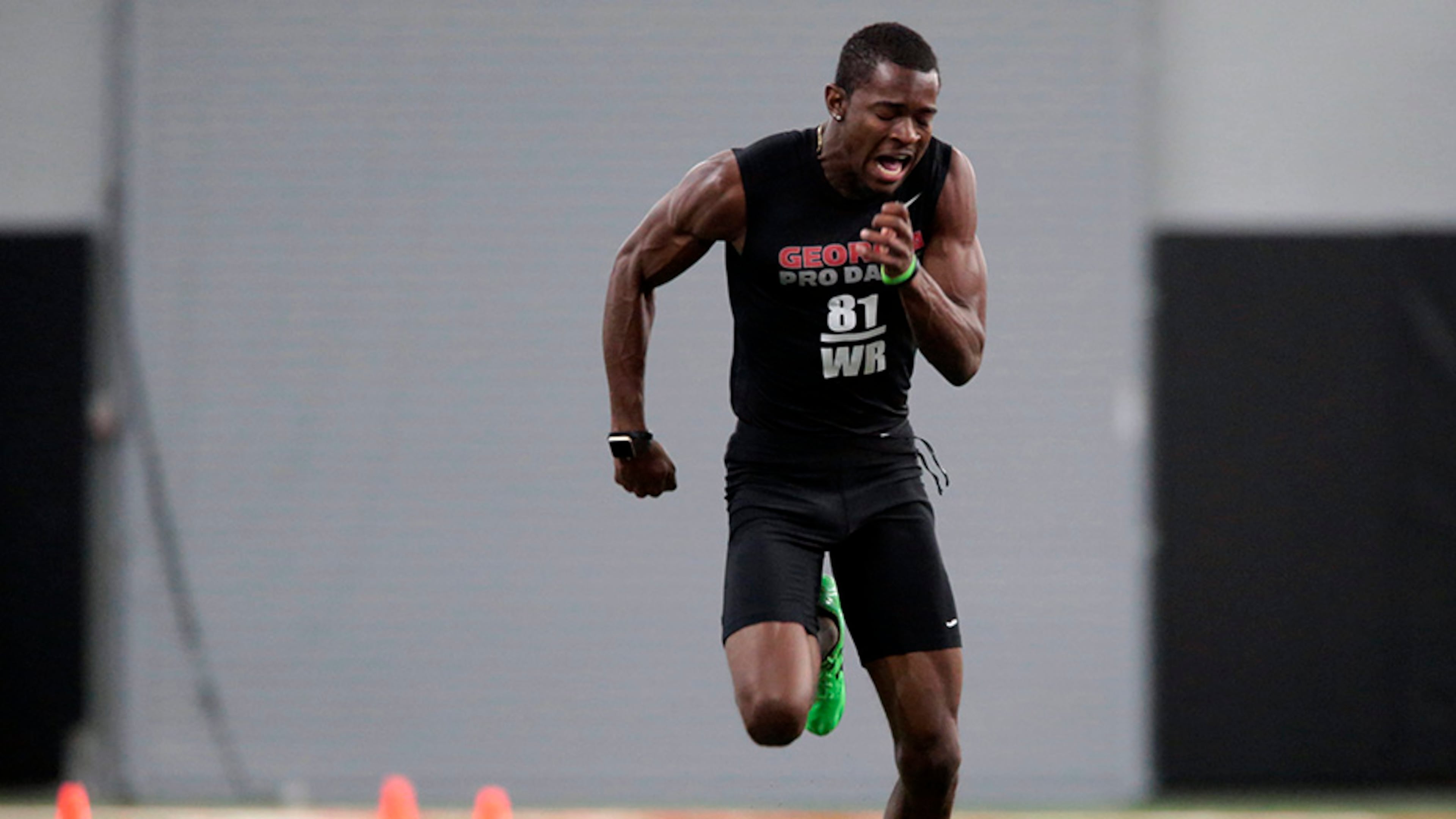 Georgia wide receiver Reggie Davis runs a drill l during pro day at the University of Georgia in Athens, Ga., Wednesday, March 15, 2017. (John Roark/Athens Banner-Herald via AP)