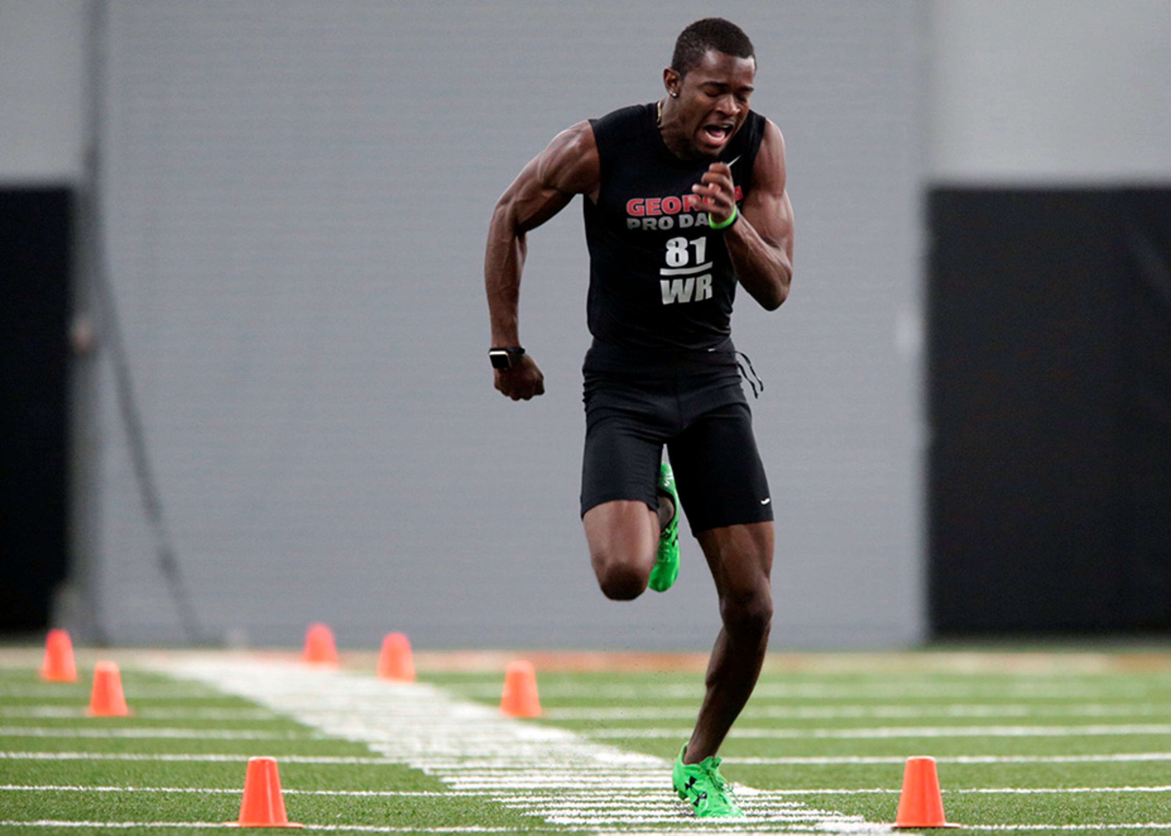 Georgia wide receiver Reggie Davis runs a drill l during pro day at the University of Georgia in Athens, Ga., Wednesday, March 15, 2017. (John Roark/Athens Banner-Herald via AP)