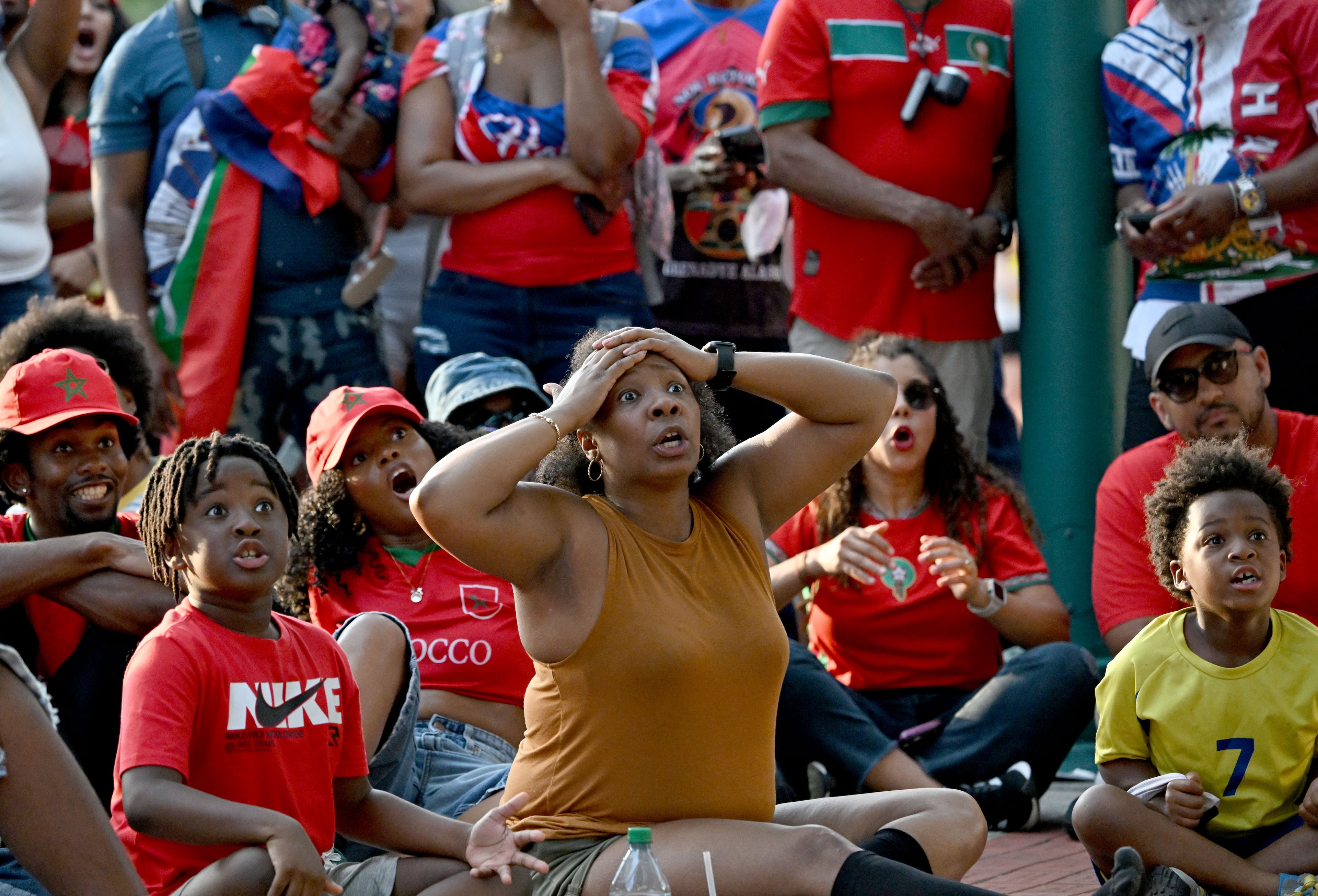 Haiti fans react as they gather to watch the match between Morocco vs. Haiti at the FIFA Fan Festival in Centennial Olympic Park on Wednesday, June 24, 2026, in Atlanta. (Hyosub Shin/AJC)