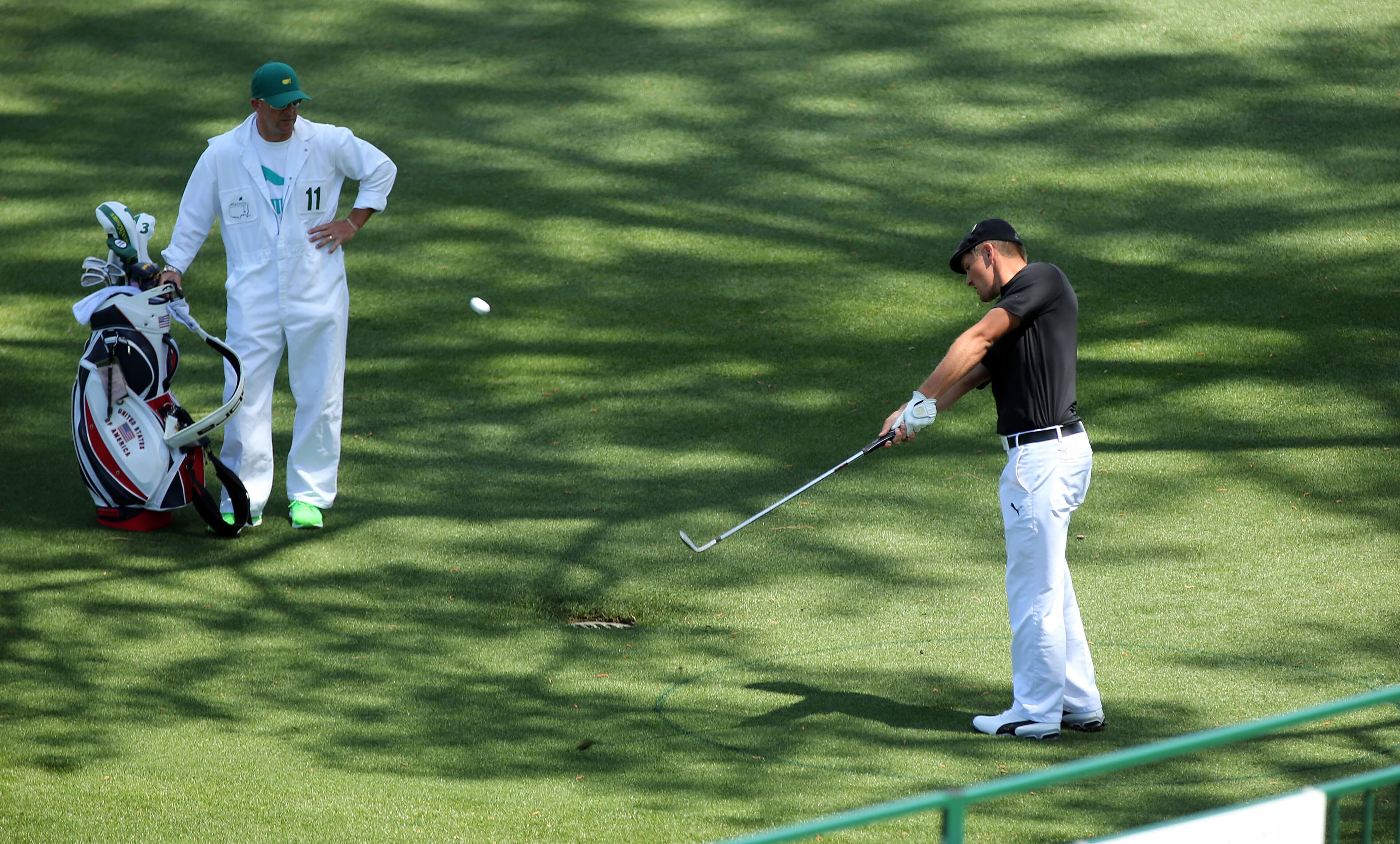 APRIL 7, 2016 AUGUSTA Bryson DeChambeau chips onto the 15th green after taking a drop from the water. Photos from the first round of the Masters Golf Tournament, at the Augusta National Golf Club, Thursday, April 7, 2016. CURTIS COMPTON/CCOMPTON@AJC.COM