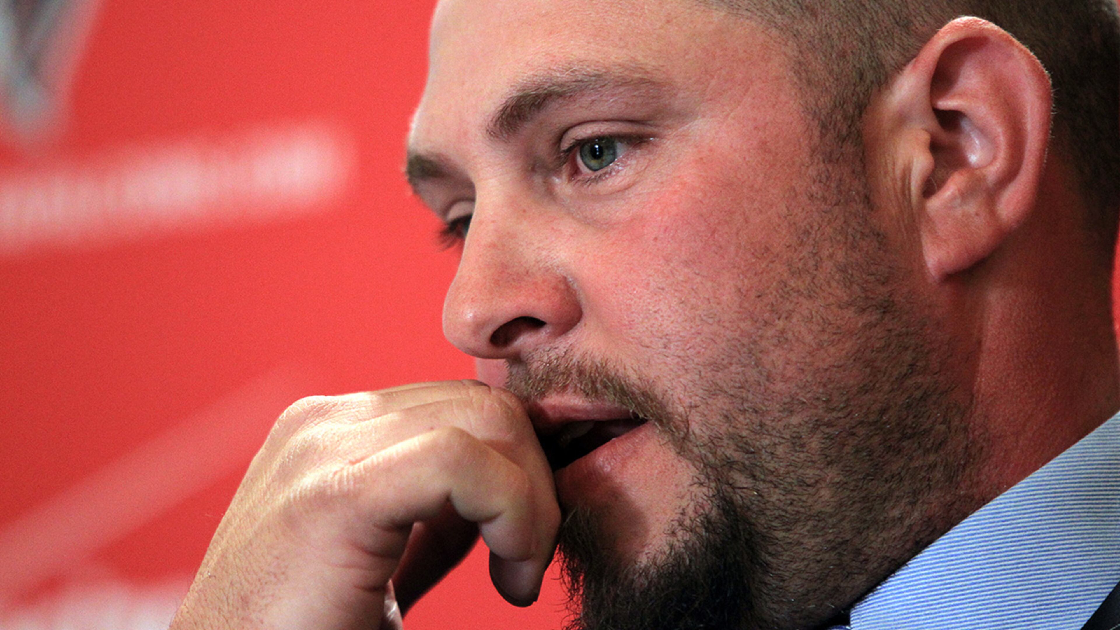 Longtime Falcons center Todd McClure holds back tears during the announcement.