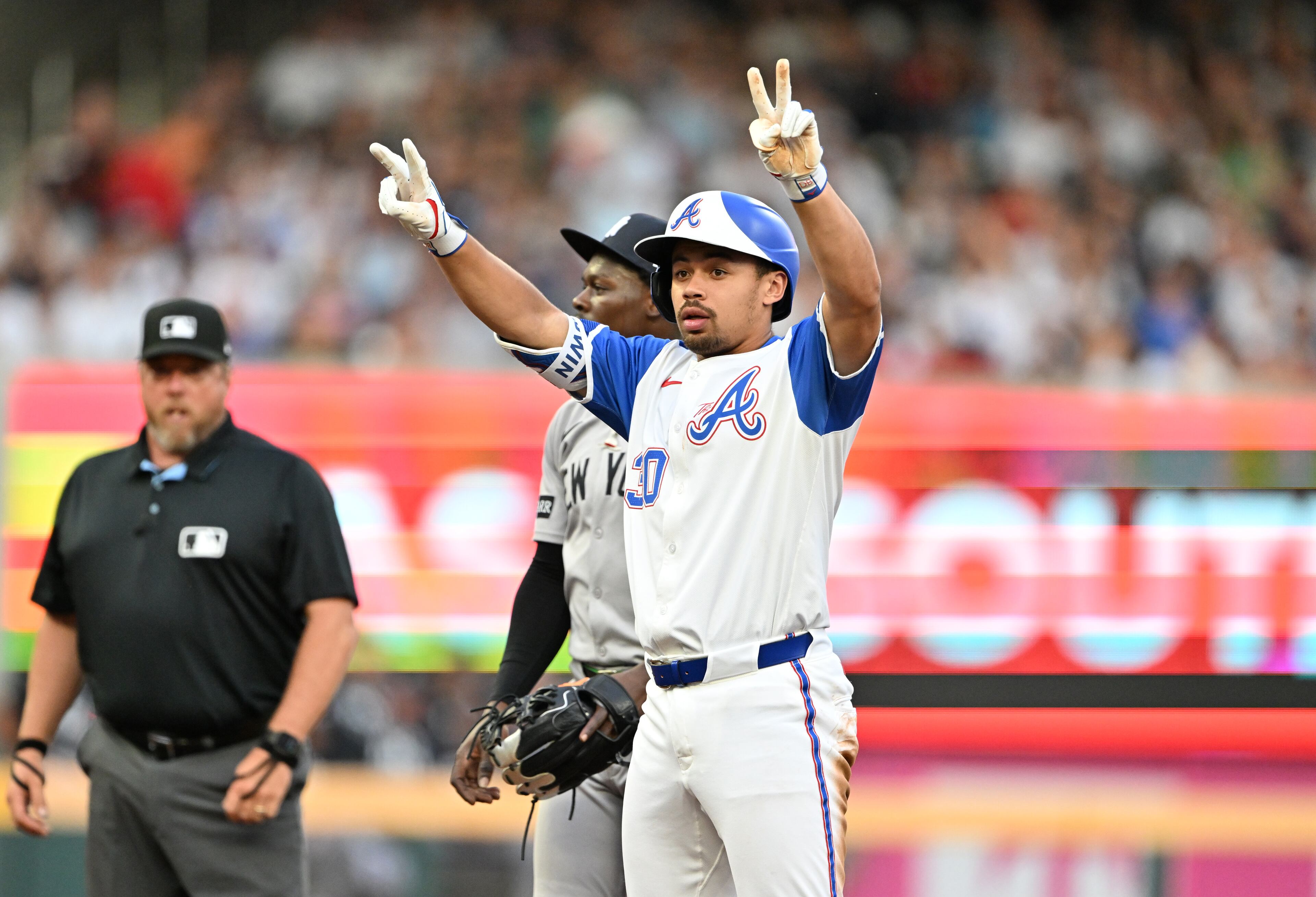 Atlanta Braves catcher Drake Baldwin (30) celebrates after hitting a double during the fourth inning of a baseball game at Truist Park, Saturday, July 19, 2025, in Atlanta. New York Yankees won 12-9 over Atlanta Braves. (Hyosub Shin / AJC)