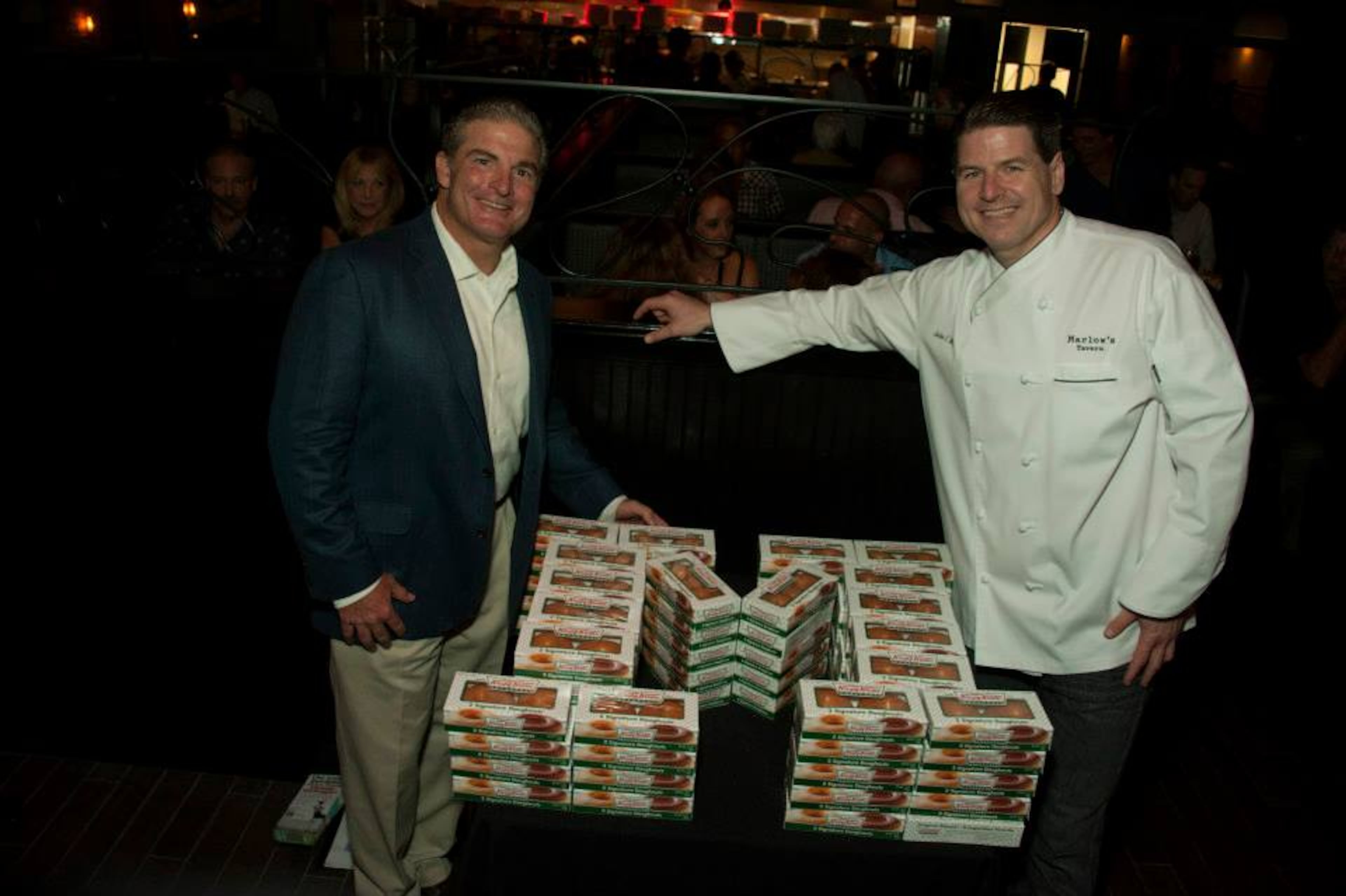 Marlow's Tavern has 15 locations in metro Atlanta and five in Orlando and Tampa, Florida. Here are co-founders Tom DiGiorgio and John Metz at the opening of a Florida Marlow's Tavern location in 2013.