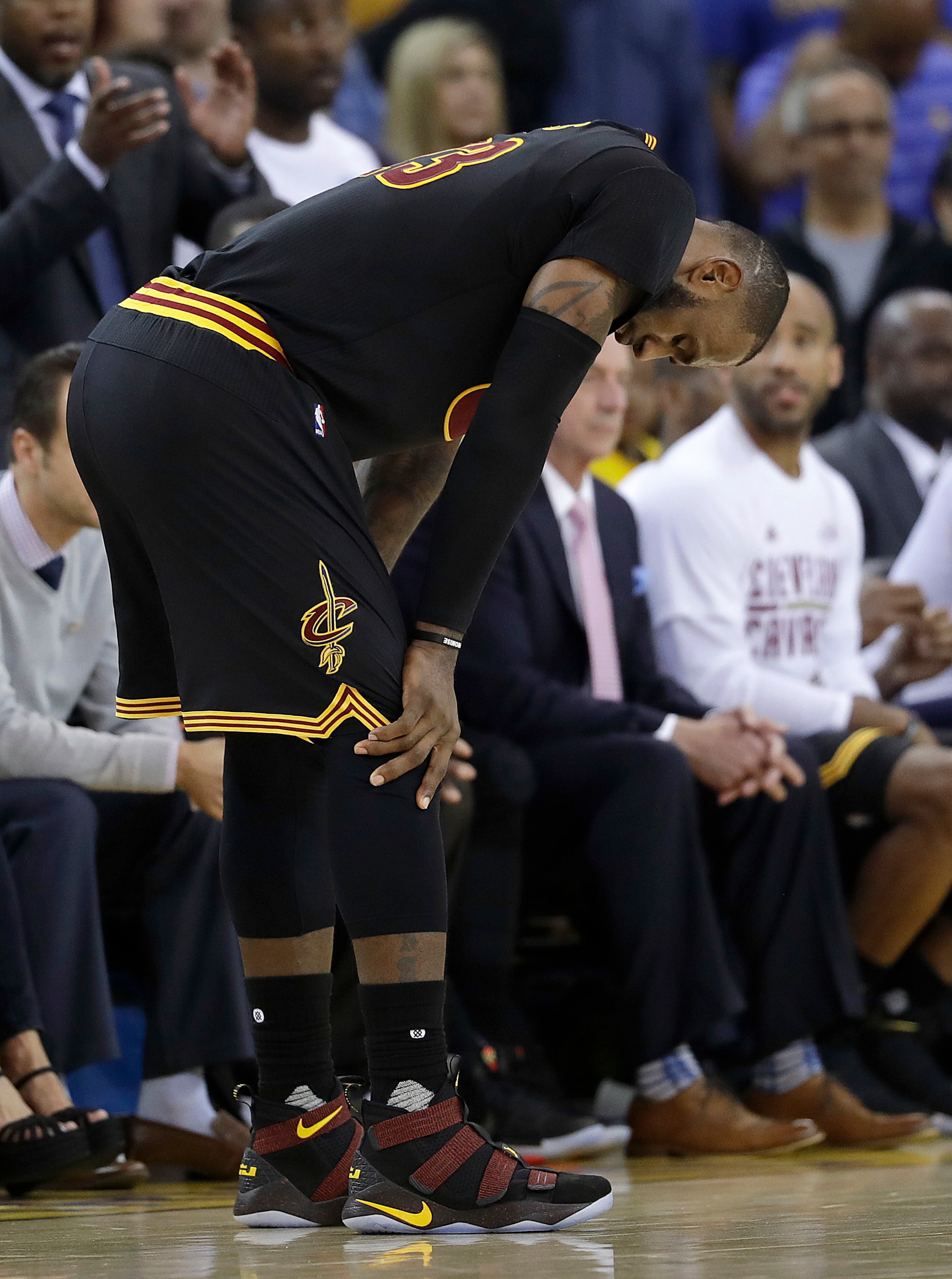 Cleveland Cavaliers forward LeBron James reacts during the second half of Game 5 of basketball's NBA Finals against the Golden State Warriors in Oakland, Calif., Monday, June 12, 2017. (AP Photo/Marcio Jose Sanchez)