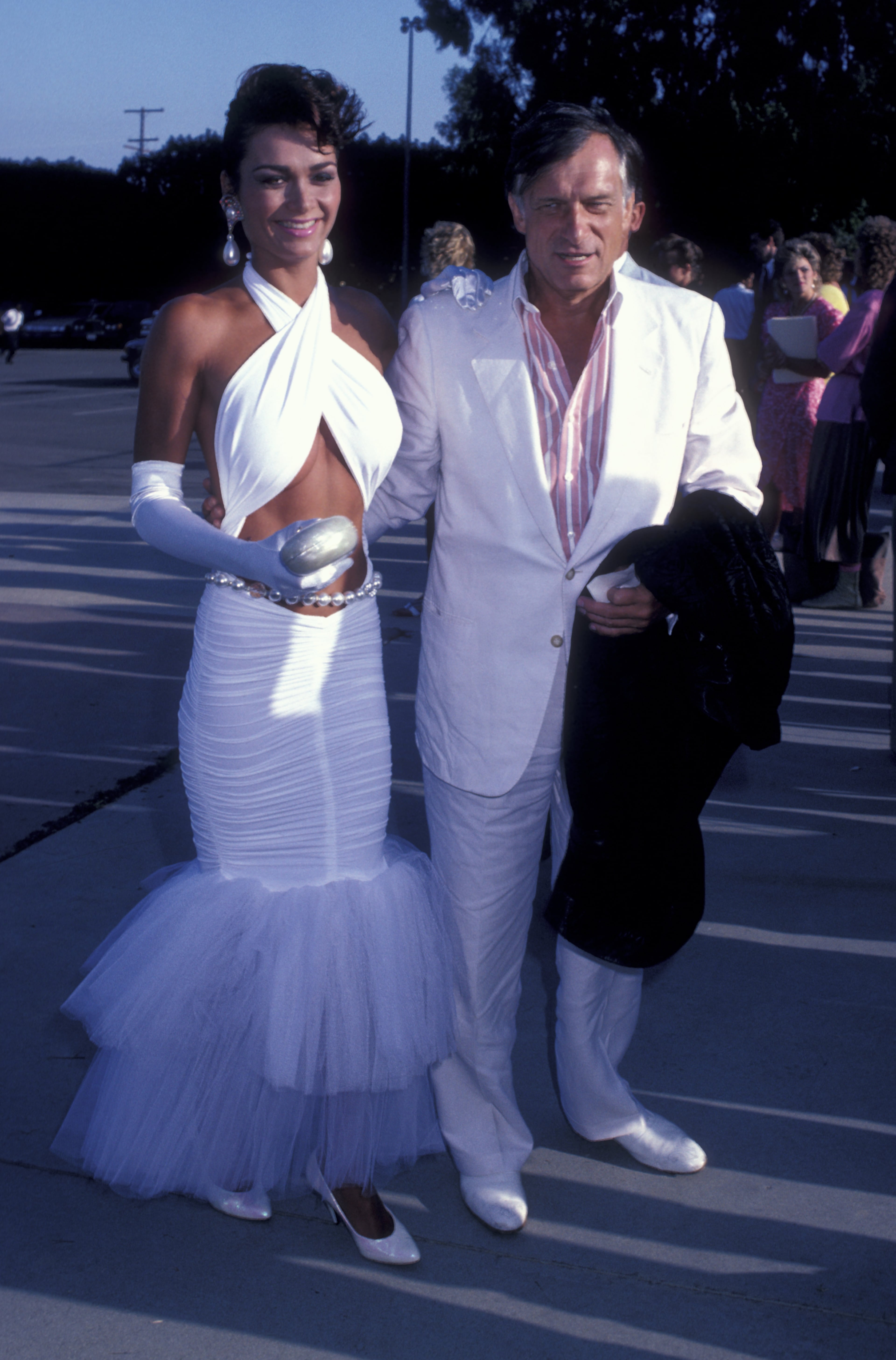 MALIBU, CA - SEPTEMBER 6: Hugh Hefner and Carrie Lee attend Benefit for Alan Cranston on September 6, 1986 at Barbra Streisand's home in Malibu, California. (Photo by Ron Galella, Ltd./WireImage)