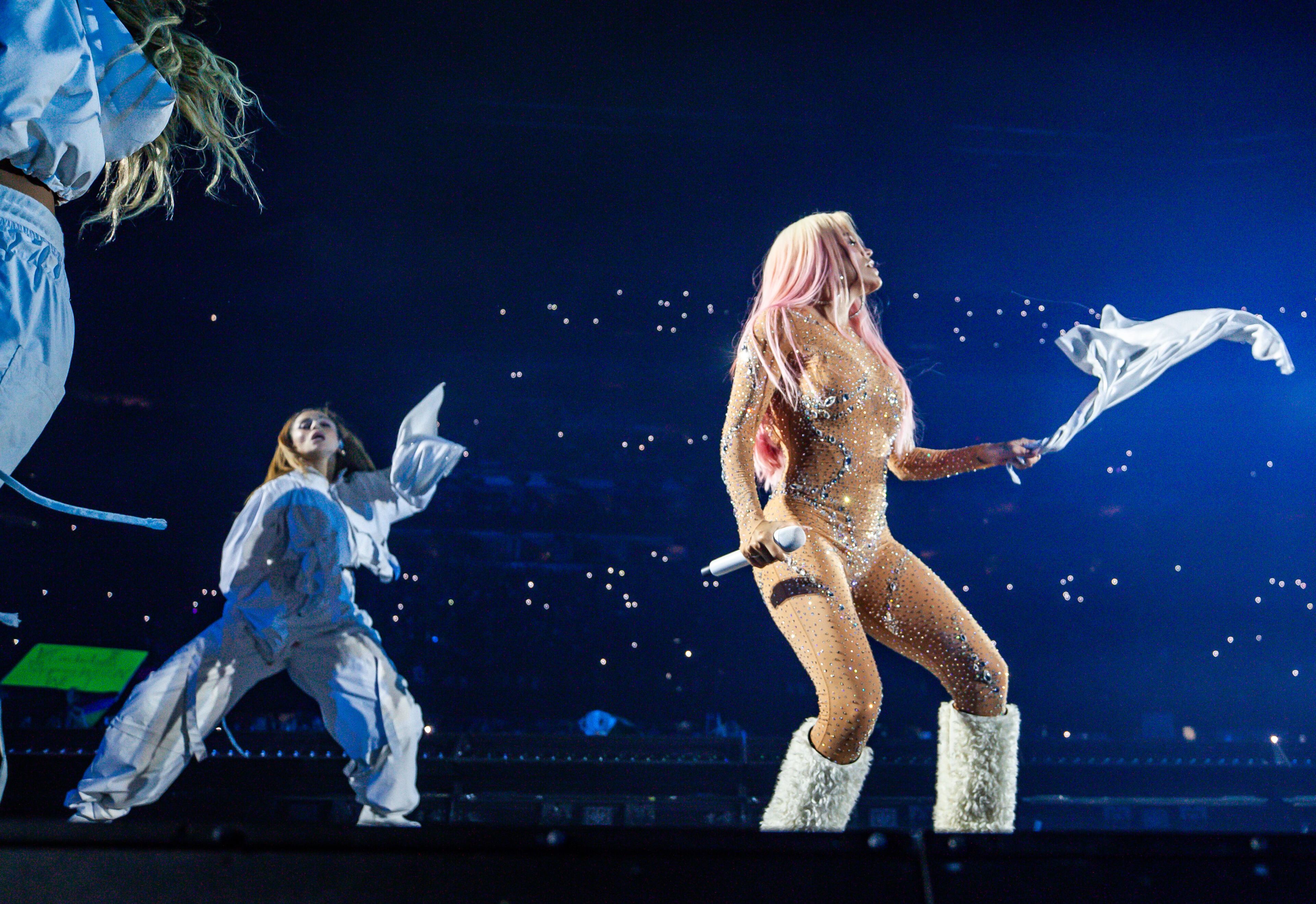 Karol G brought a stunning performance to Mercedes-Benz Stadium on Thursday, Sept. 21, 2023,where the throng of fans showed up in their best Karol G-inspired outfits. (Ryan Fleisher FOR THE ATLANTA JOURNAL-CONSTITUTION)