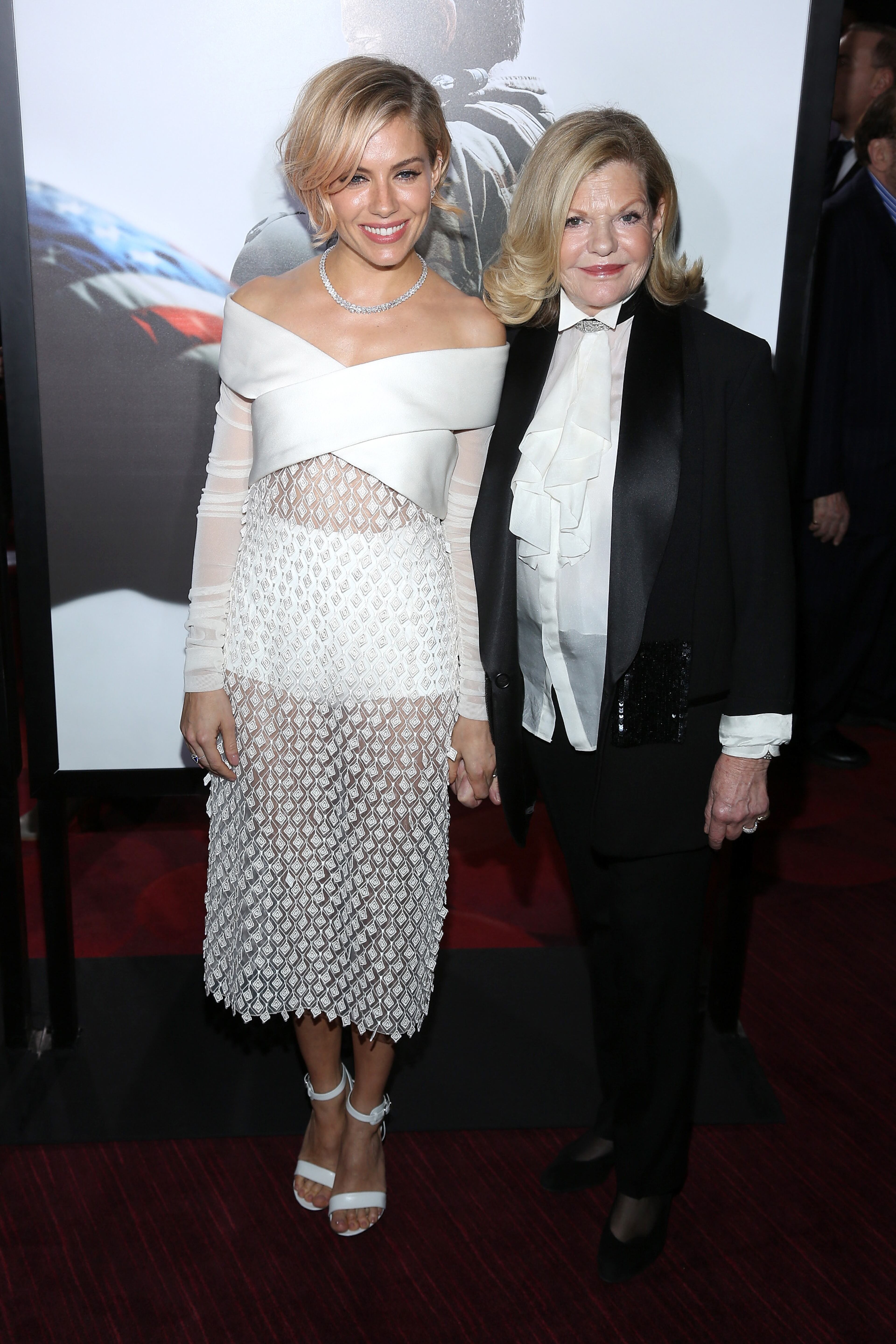 NEW YORK, NY - DECEMBER 15: Actress Sienna Miller (L) and Jo Miller arrive at the "American Sniper" New York Premiere at Frederick P. Rose Hall, Jazz at Lincoln Center on December 15, 2014 in New York City. (Photo by Rob Kim/Getty Images)