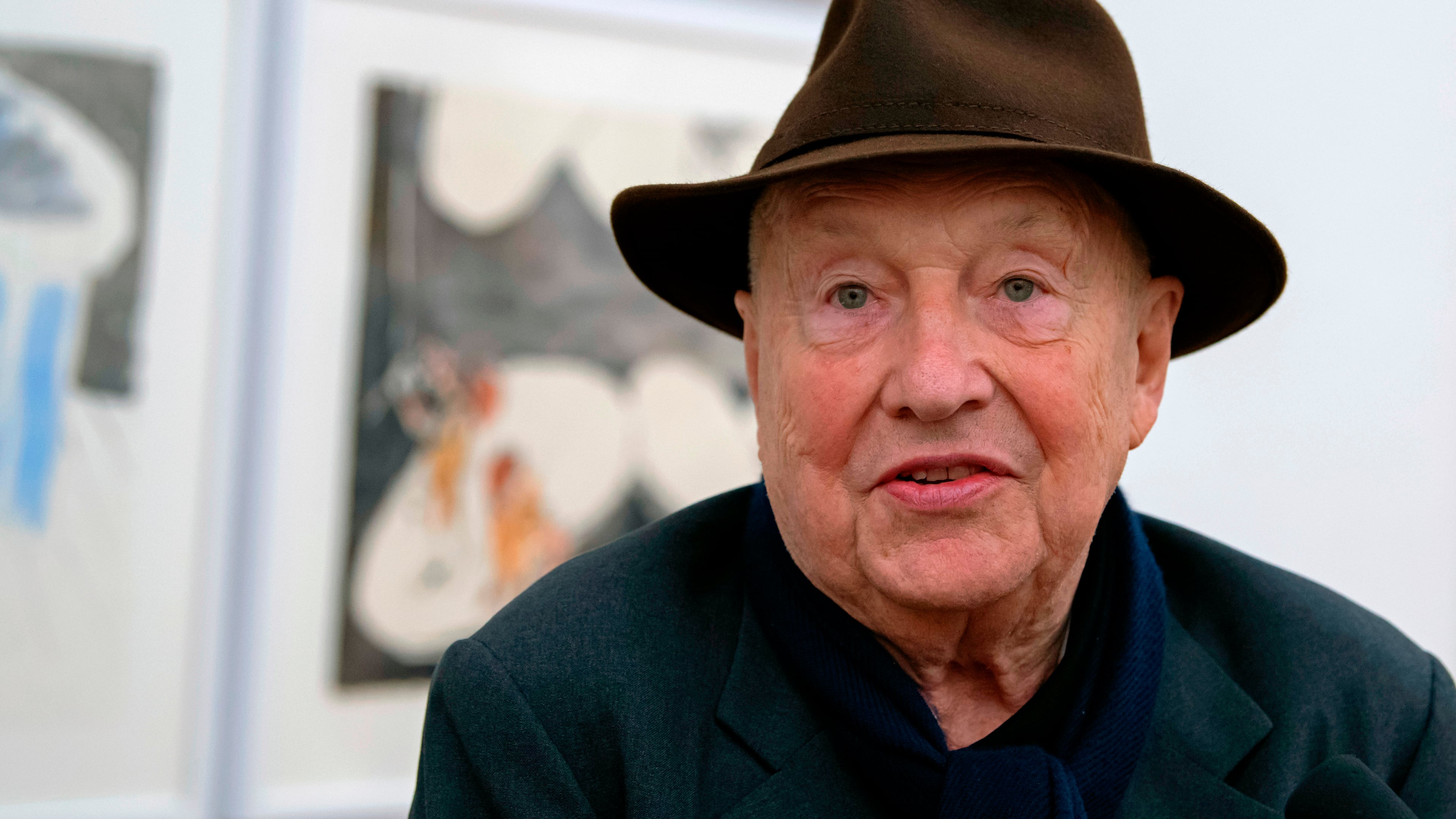 FILE - German artist Georg Baselitz talks with journalists during the press preview of the exhibition 'Georg Baselitz' in the Kunstsammlungen in Chemnitz, Germany, on April 16, 2018. (AP Photo/Jens Meyer, File)