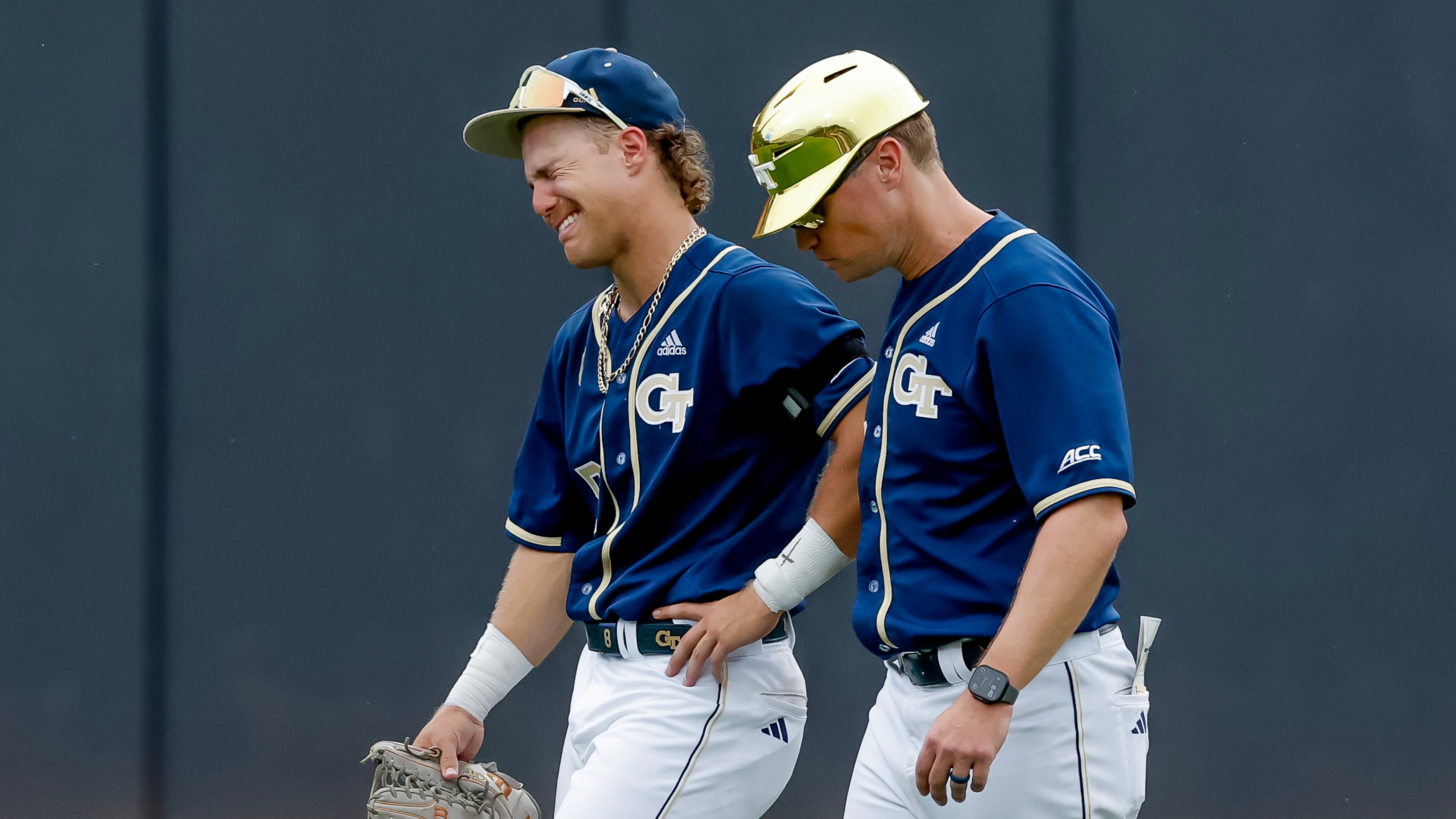 Georgia Tech head coach James Ramsey, right, consoles Drew Burress (8), after Oklahoma hit a solo home run against Tech during the 10th inning to win the NCAA D1 Atlanta Regional elimination baseball game at Russ Chandler Stadium, Monday, June 1, 2026, in Atlanta. (Erik S. Lesser for the AJC)