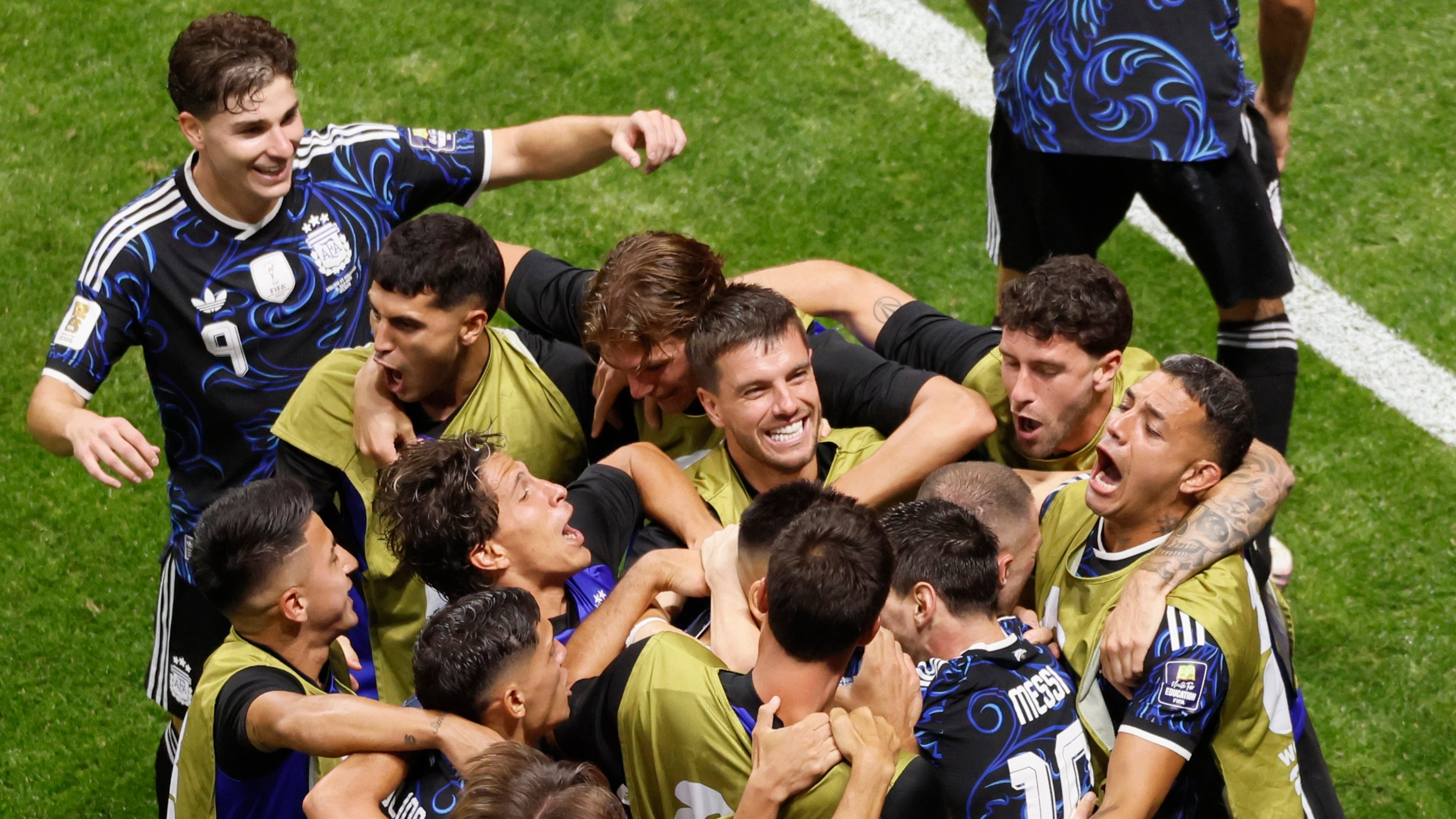 Argentina's Lautaro Martinez is mobbed by teammates after the winning goal during the second half of the Argentina vs. England FIFA World Cup semifinal match at Atlanta Stadium (Mercedes-Benz Stadium) on Wednesday, July 15, 2026. (Miguel Martinez/AJC)