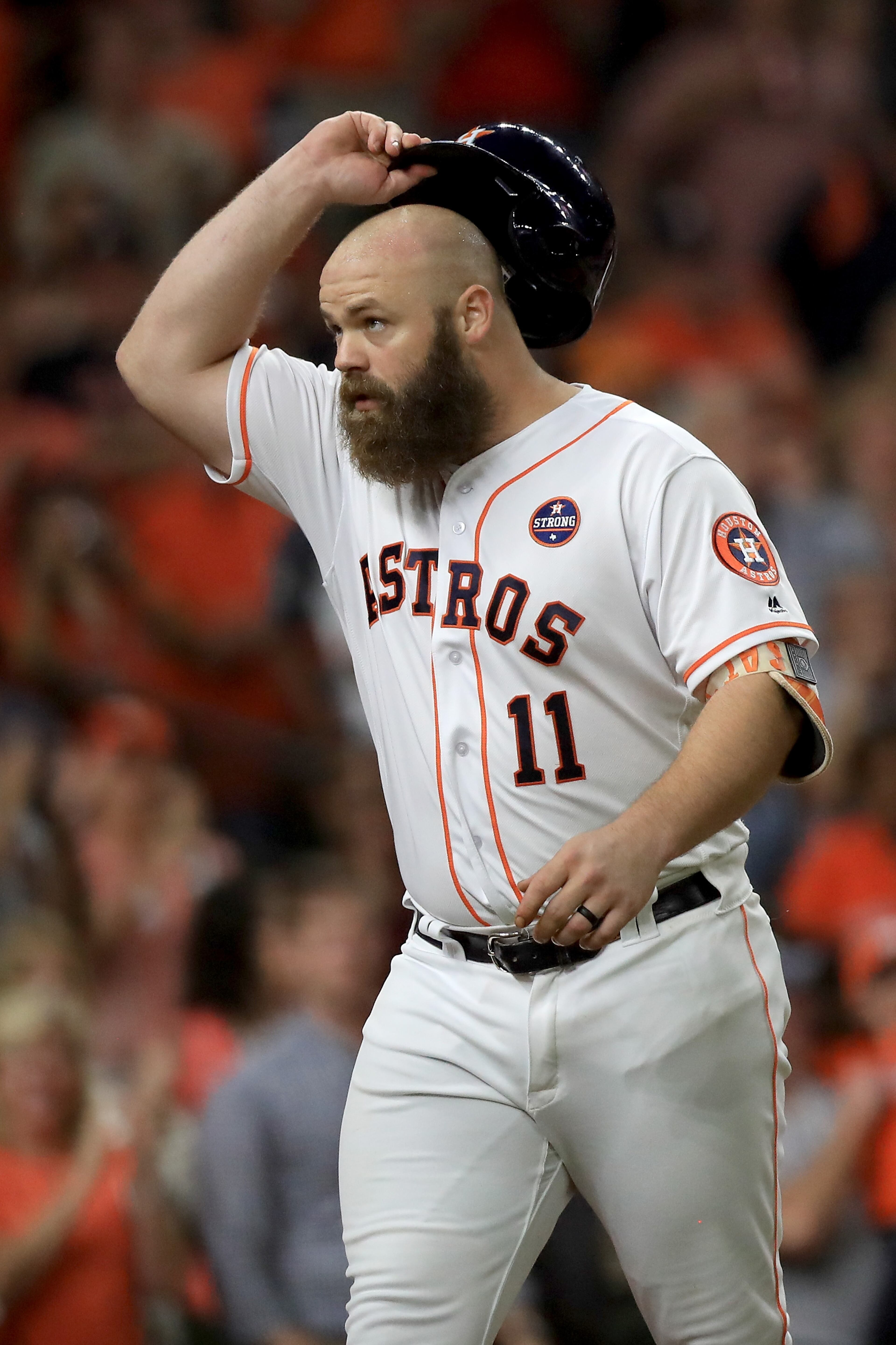 HOUSTON, TX - OCTOBER 21: Evan Gattis #11 of the Houston Astros celebrates after hitting a a solo home run against CC Sabathia #52 of the New York Yankees during the fourth inning in Game Seven of the American League Championship Series at Minute Maid Park on October 21, 2017 in Houston, Texas. (Photo by Ronald Martinez/Getty Images)