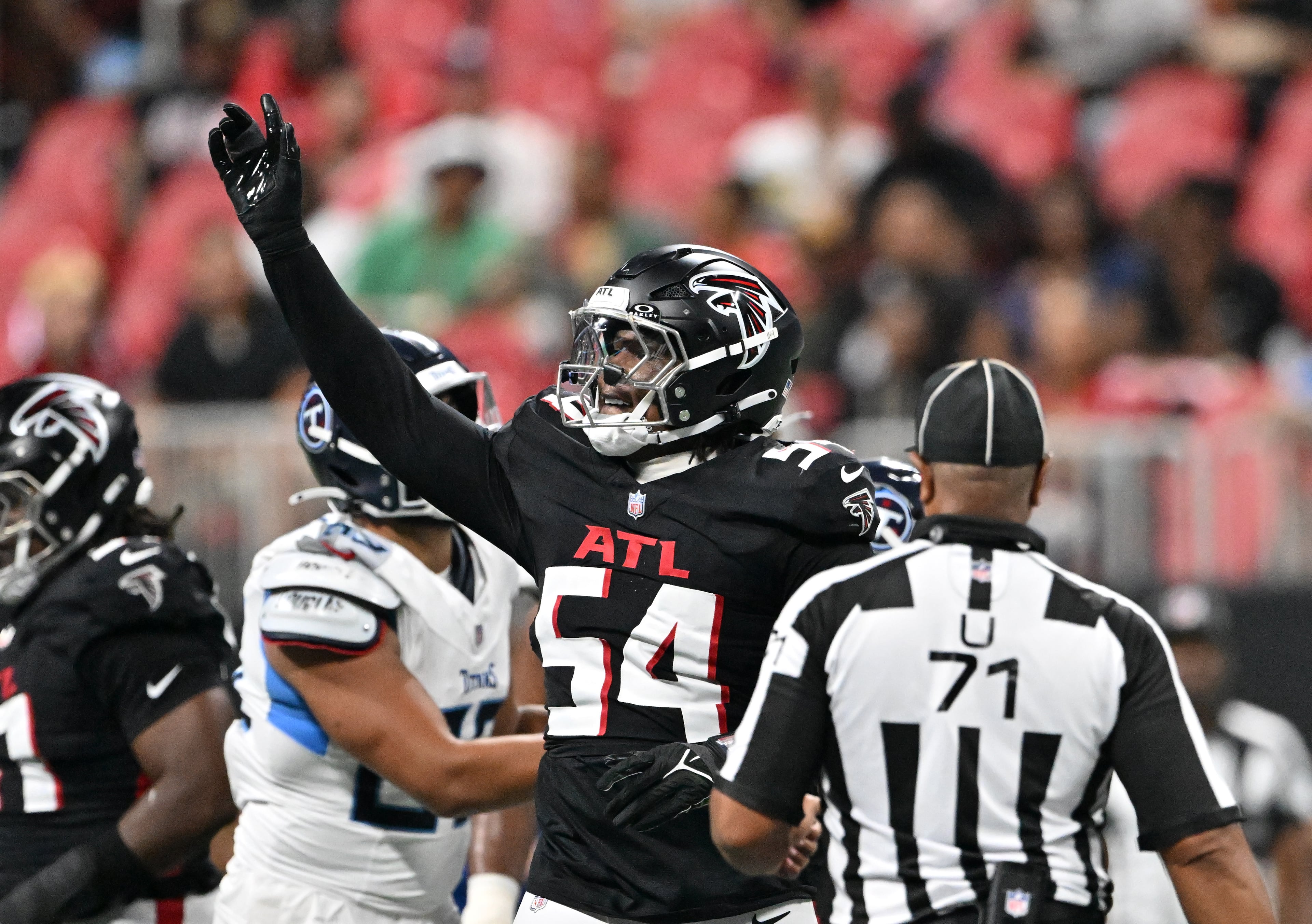 Atlanta Falcons defensive tackle Brandon Dorlus reacts during the second half of an NFL preseason game at Mercedes-Benz Stadium, Friday, Aug. 15, 2025, in Atlanta. (Hyosub Shin/AJC)