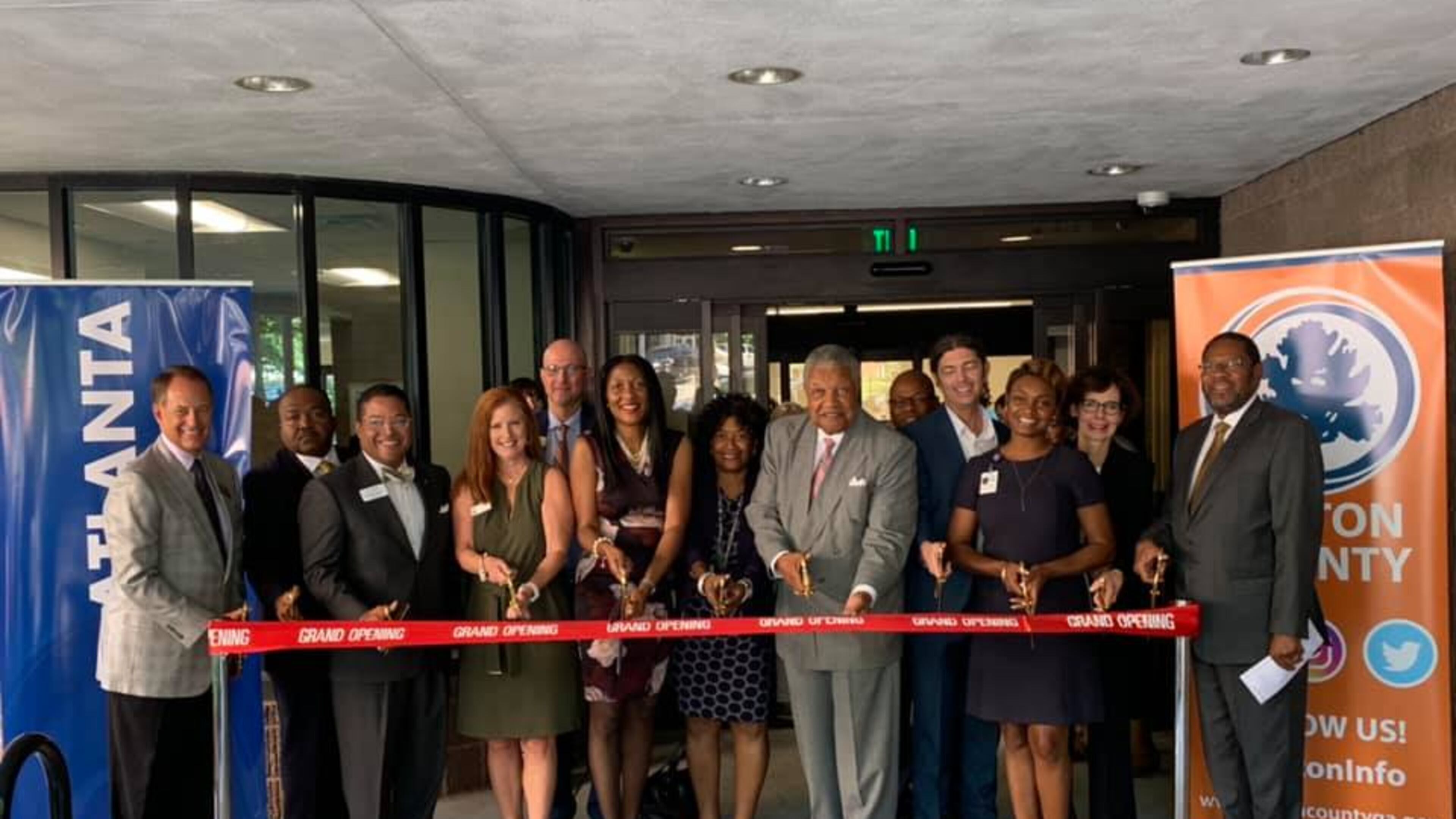 Dignitaries cut the ribbon on the newly renovated Dogwood Library on Monday, Aug. 12. COURTESY OF FULTON COUNTY LIBRARY SYSTEM