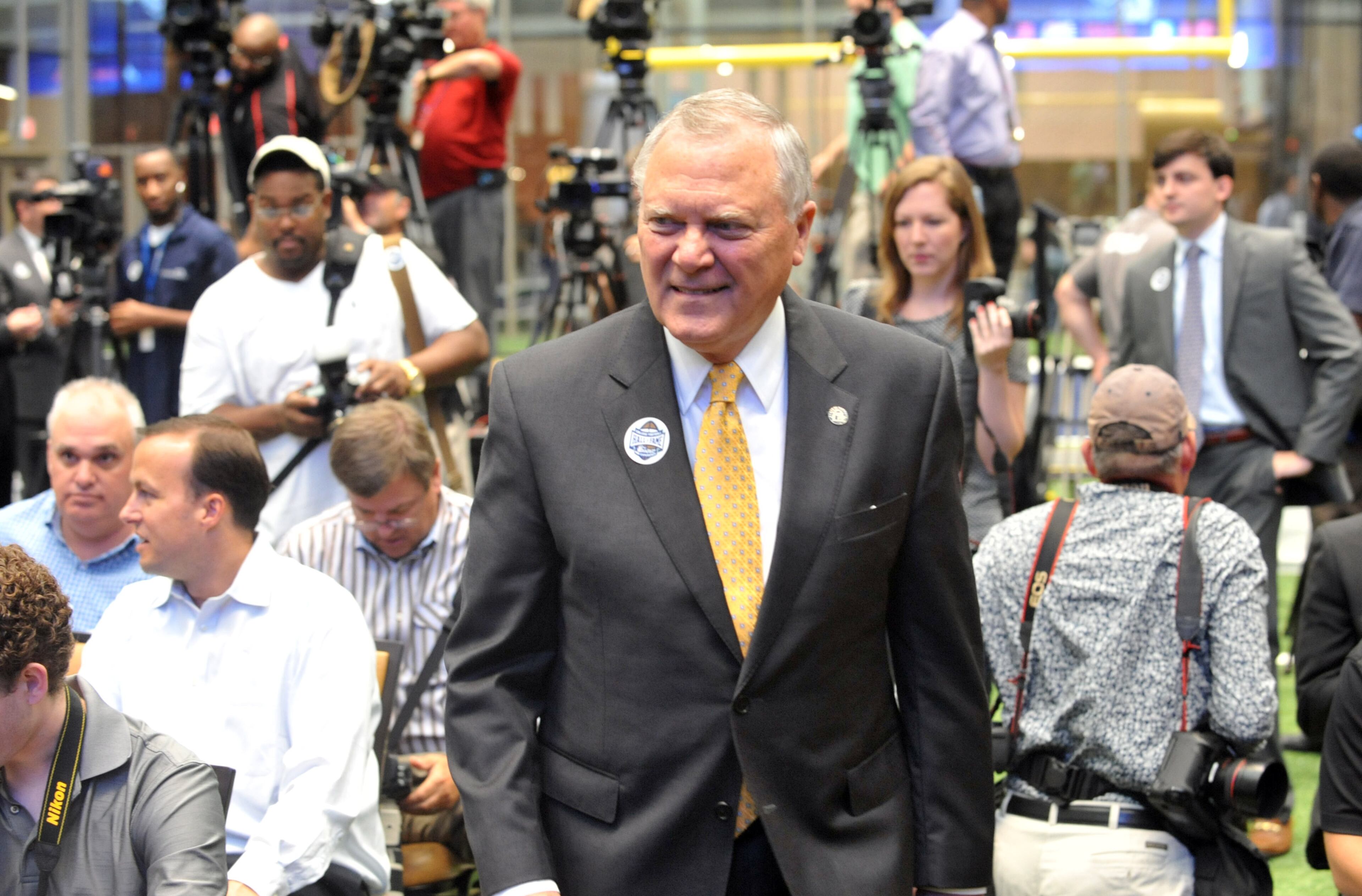Georgia Gov. Nathan Deal enters the College Football Hall of Fame to give remarks at a press conference and media day at the College Football Hall of Fame on Wednesday, August 20, 2014. The museum, which costs $68.5 million and measures 94,000-square feet, moved to Atlanta from South Bend, Ind.